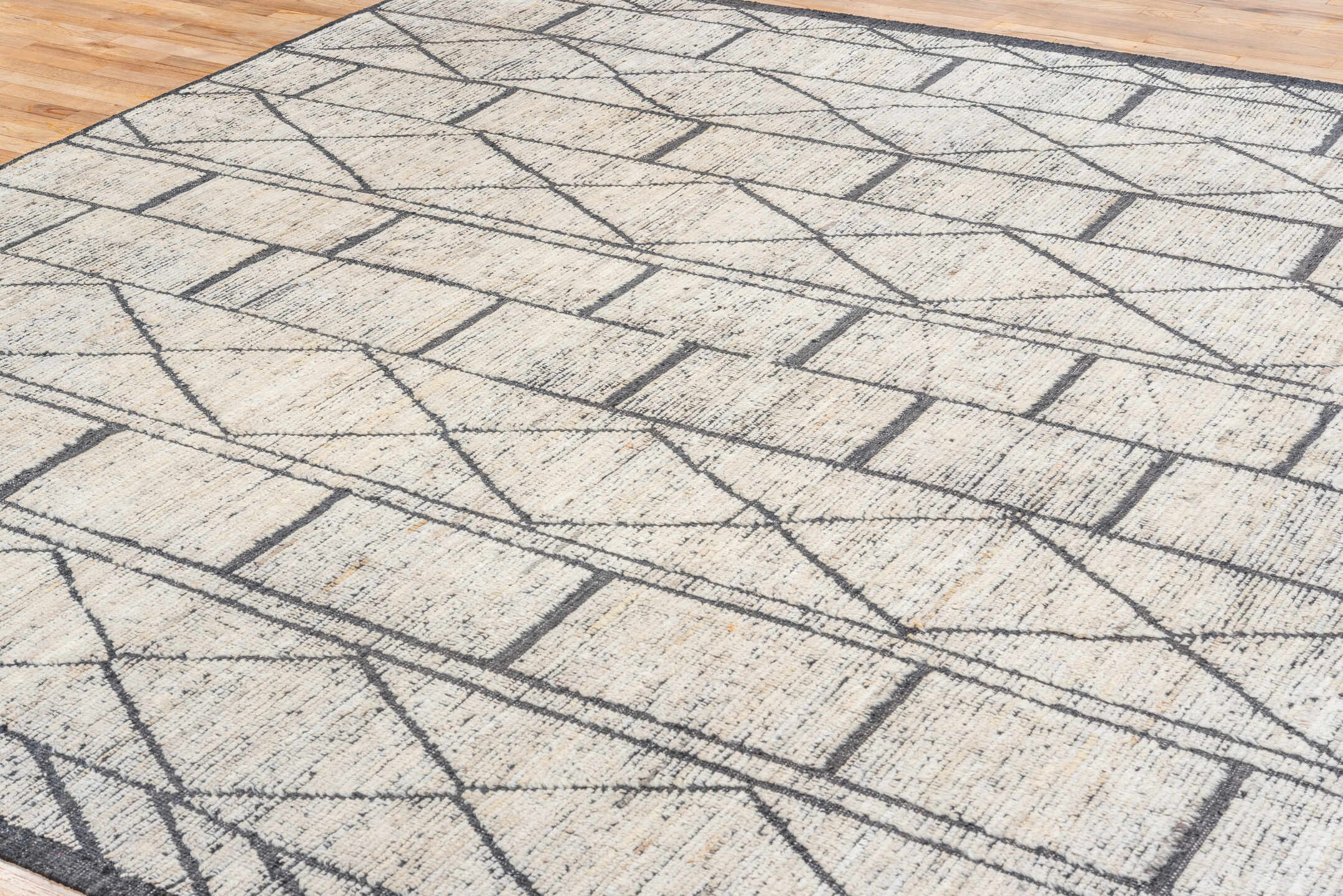9' x 12' one-of-a-kind handmade vintage Tulu large size rug. Color palette: ivory, charcoal, slate, cream, gray, black