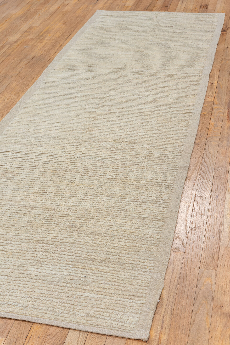 3' x 10' one-of-a-kind handmade vintage Tulu runner rug. Color palette: brown, gray, light gray, linen, off-white, pink