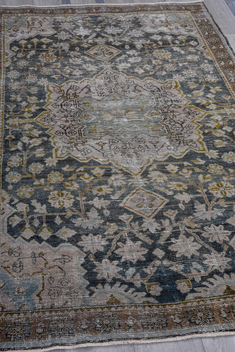 4' x 7' one-of-a-kind handmade antique Malayer rug. Color palette: ivory, indigo, brown, sky blue, taupe, olive, purple