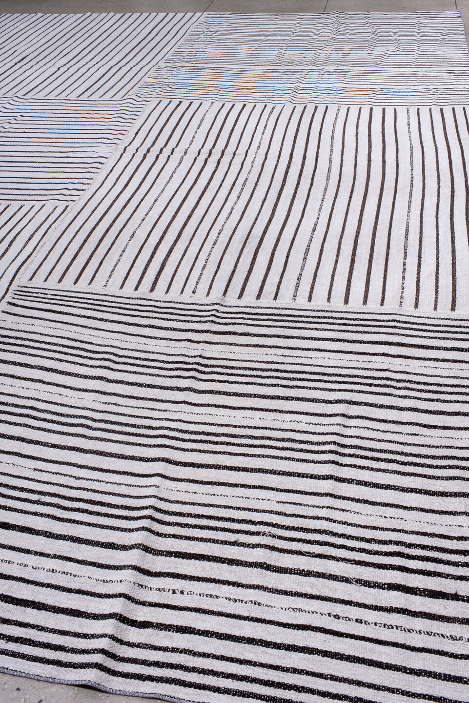 11' x 16' one-of-a-kind handmade antique Flatweave oversize rug. Color palette: ivory, charcoal, gray, black