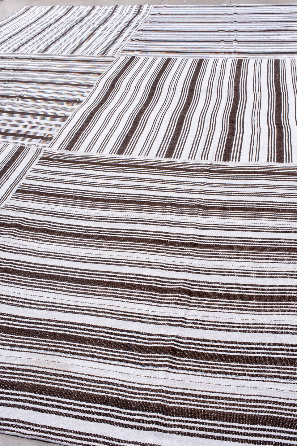 12' x 18' one-of-a-kind handmade antique Flatweave oversize rug. Color palette: ivory, dark brown, brown