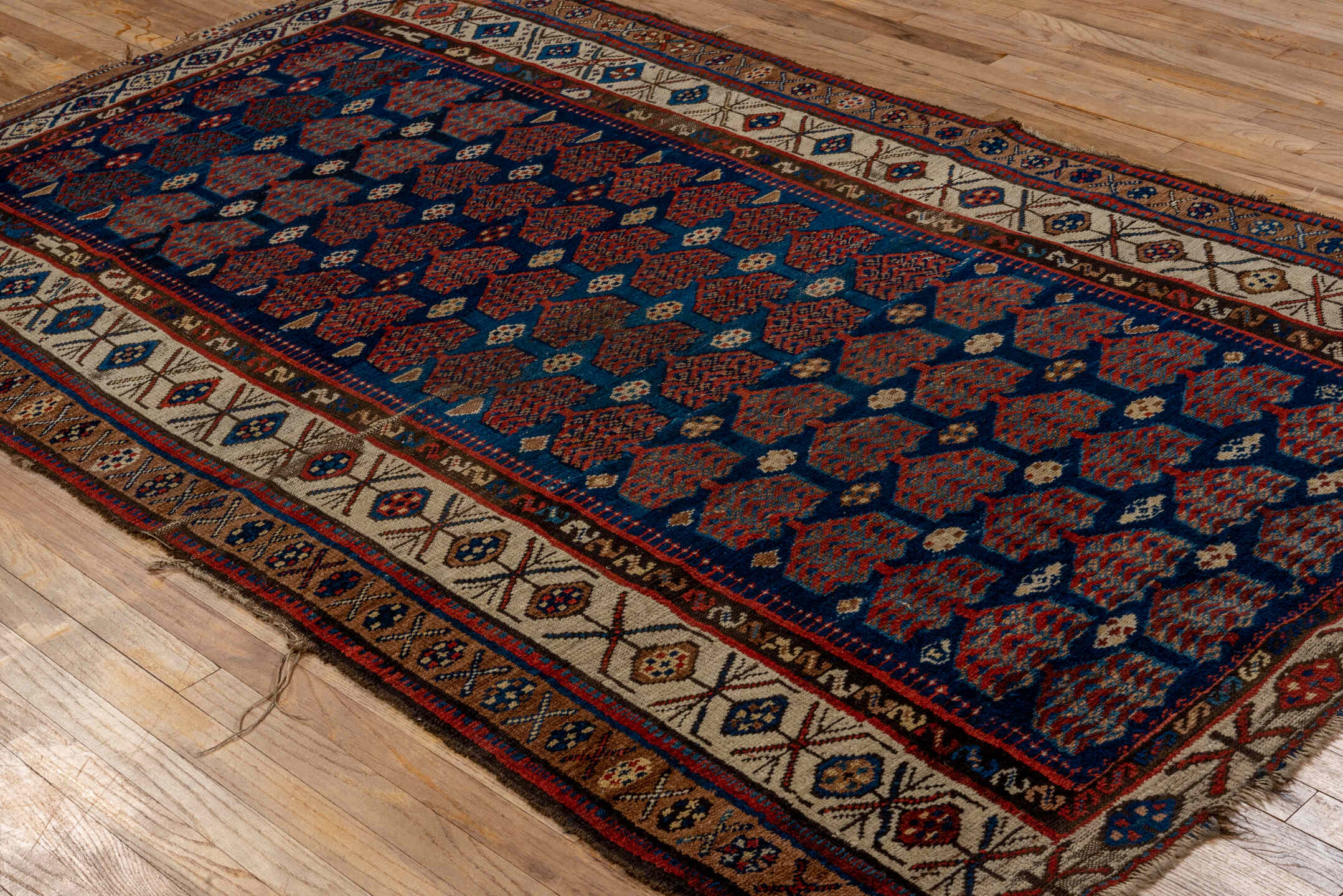 5' x 8' one-of-a-kind handmade vintage Kurd medium size rug. Color palette: blue, brown, dim gray, gray, pink, red