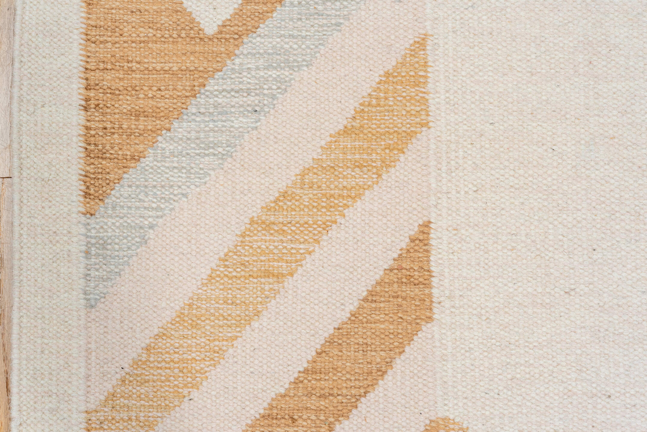 5' x 7' one-of-a-kind handmade vintage Rollaken rug. Color palette: ivory, camel, cream, pale_blue, beige, light blue