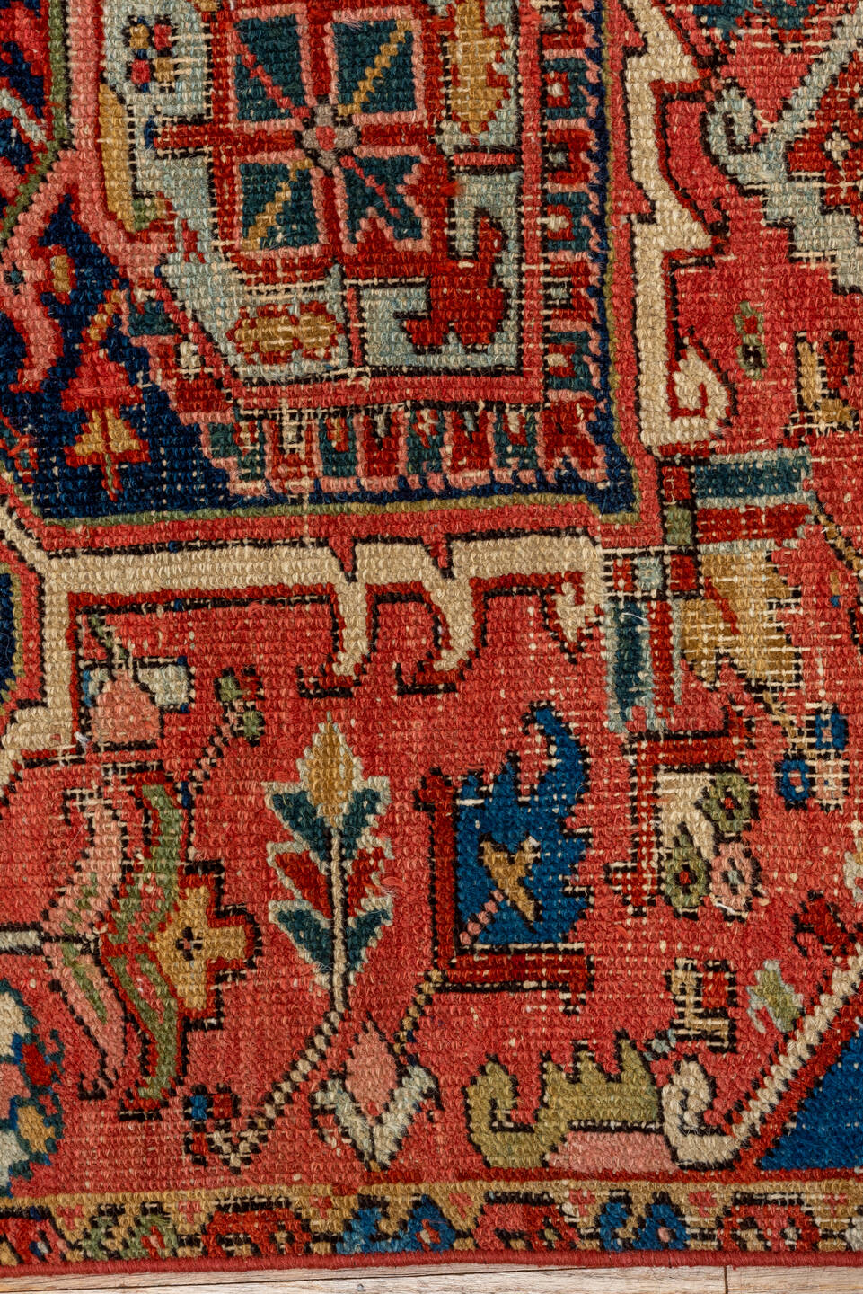 5' x 8' one-of-a-kind handmade vintage Heriz medium size rug. Color palette: coral, navy, sky blue, ivory, rust, sage, camel
