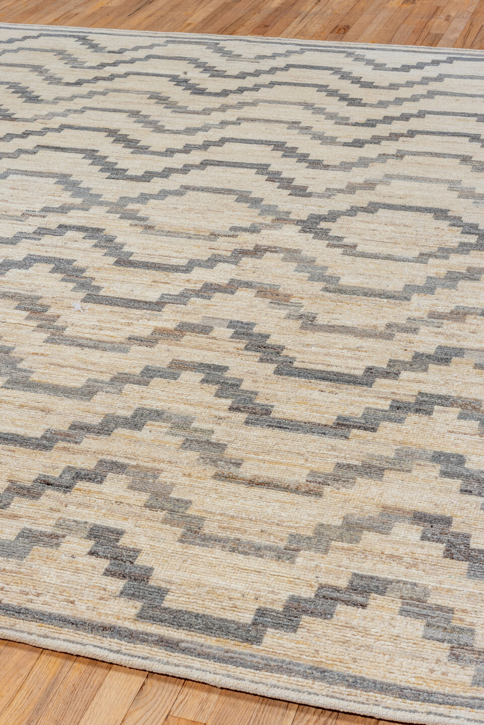 8' x 9' one-of-a-kind handmade vintage Afghan rug. Color palette: ivory, gray, charcoal, cream, taupe, black, beige