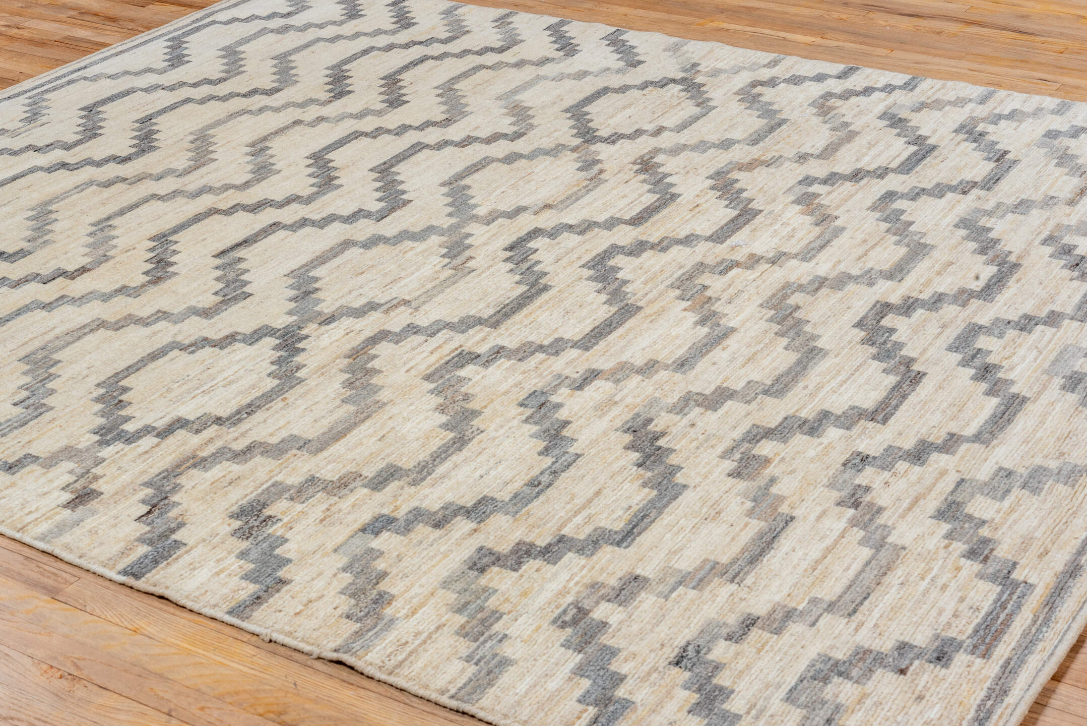 8' x 9' one-of-a-kind handmade vintage Afghan rug. Color palette: ivory, gray, charcoal, cream, taupe, black, beige