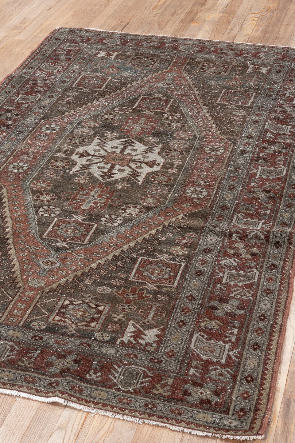 4' x 6' one-of-a-kind handmade vintage Malayer small size rug. Color palette: brown, rust, ivory, burgundy, taupe