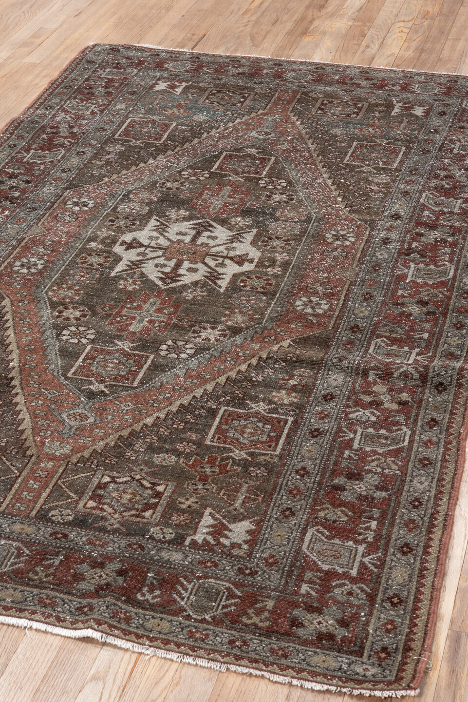 4' x 6' one-of-a-kind handmade vintage Malayer small size rug. Color palette: brown, rust, ivory, burgundy, taupe