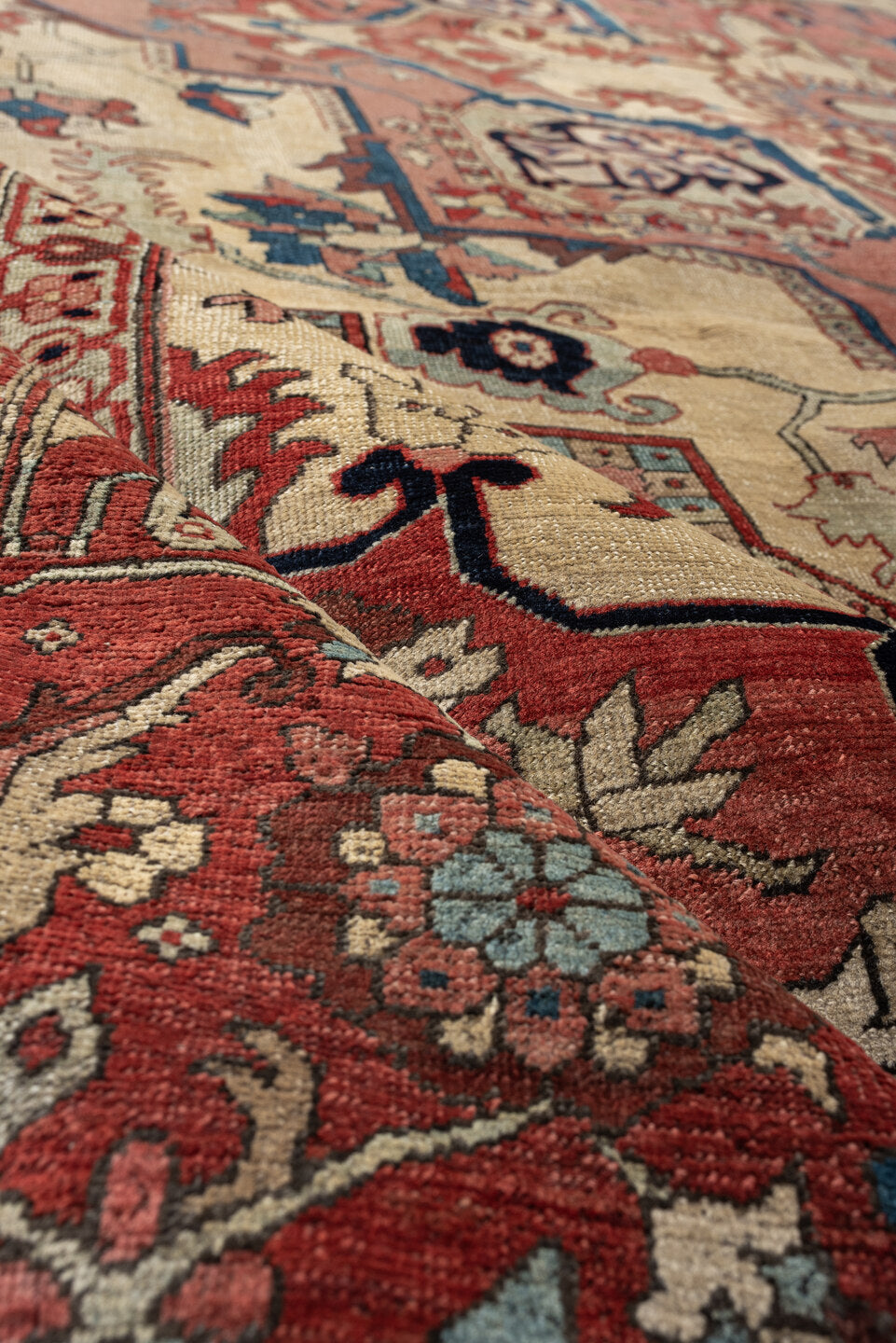 9' x 12' one-of-a-kind handmade vintage Serapi large size rug. Color palette: ivory, terracotta, rose, deep blue, rust