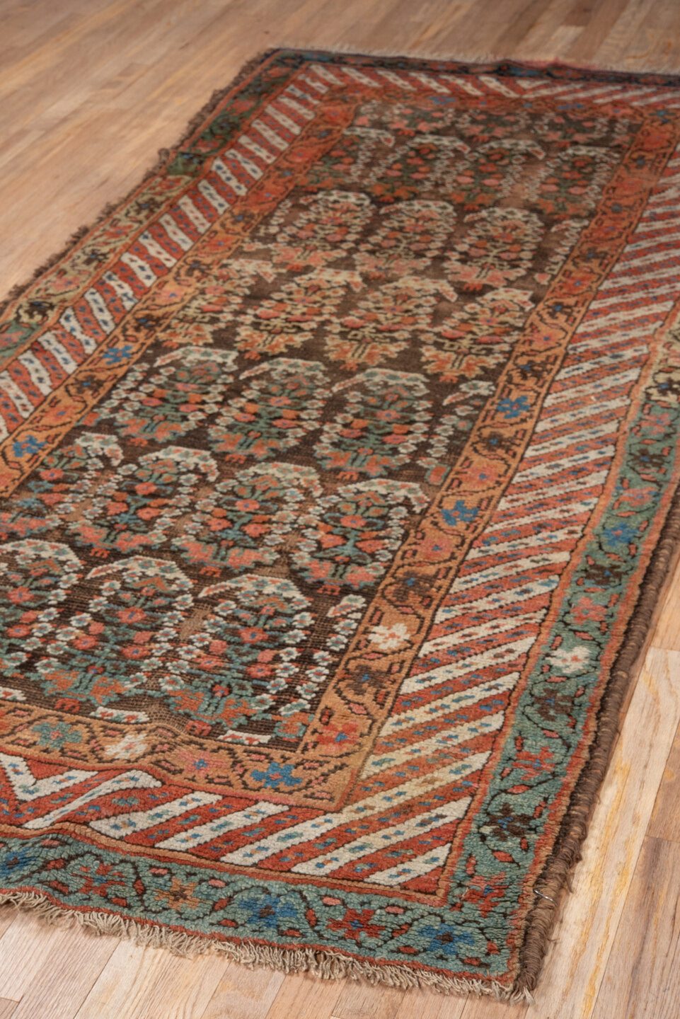 4' x 8' one-of-a-kind handmade vintage Kurd runner rug. Color palette: brown, coral, turquoise, ivory, rust, teal, camel