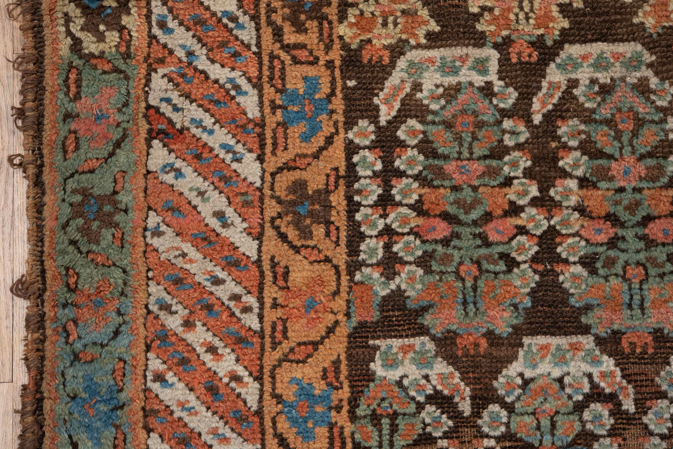 4' x 8' one-of-a-kind handmade vintage Kurd runner rug. Color palette: brown, coral, turquoise, ivory, rust, teal, camel