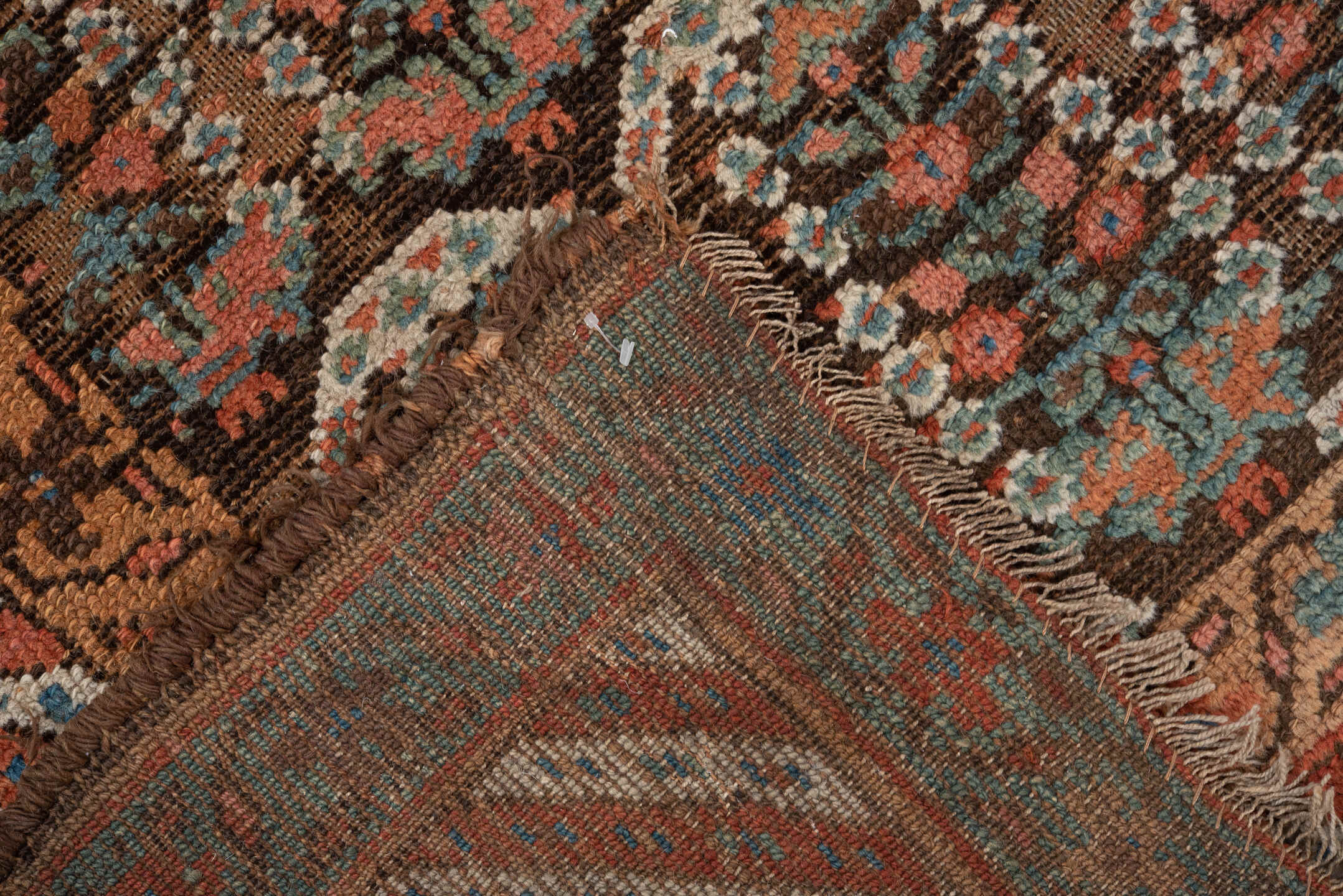 4' x 8' one-of-a-kind handmade vintage Kurd runner rug. Color palette: brown, coral, turquoise, ivory, rust, teal, camel