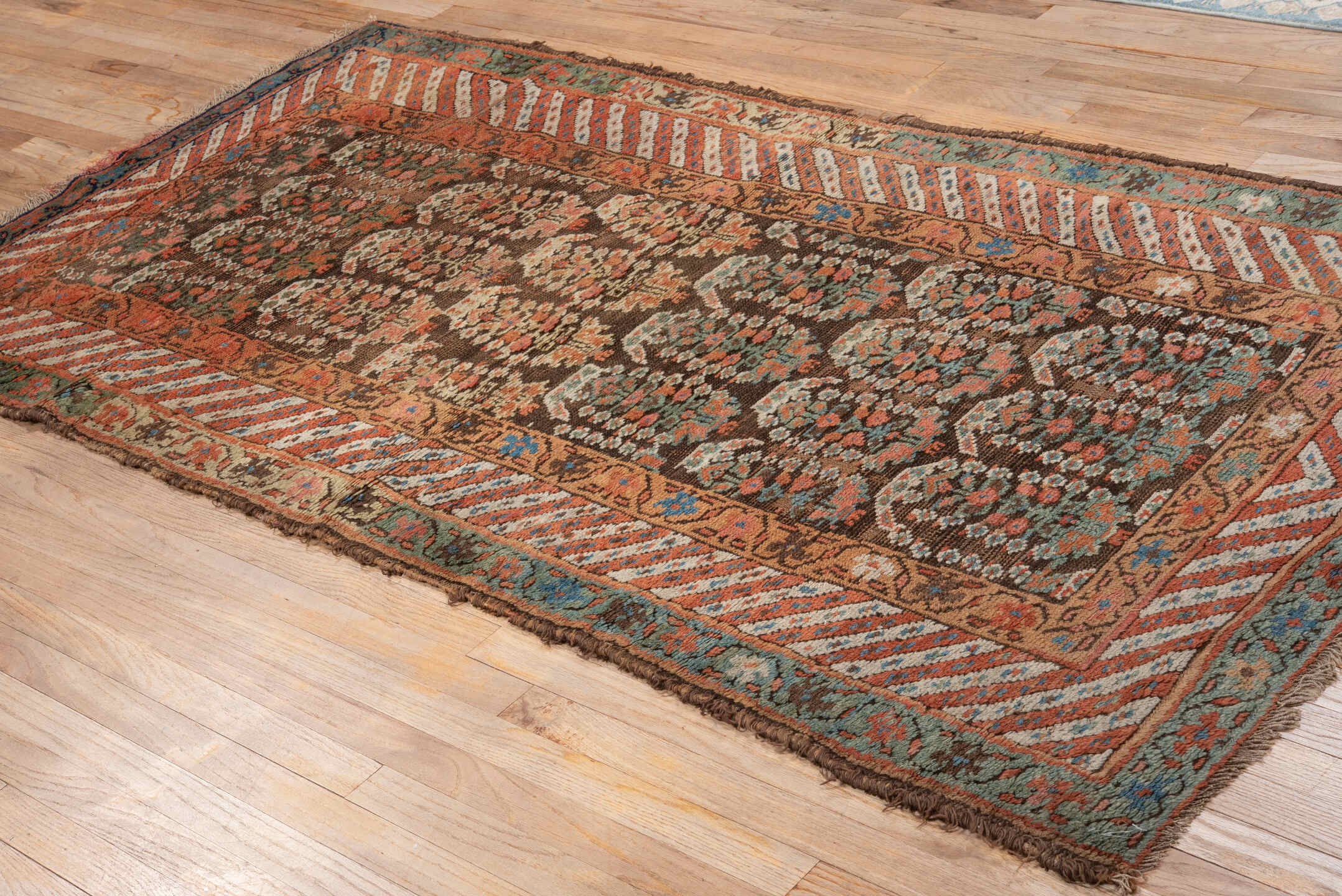 4' x 8' one-of-a-kind handmade vintage Kurd runner rug. Color palette: brown, coral, turquoise, ivory, rust, teal, camel