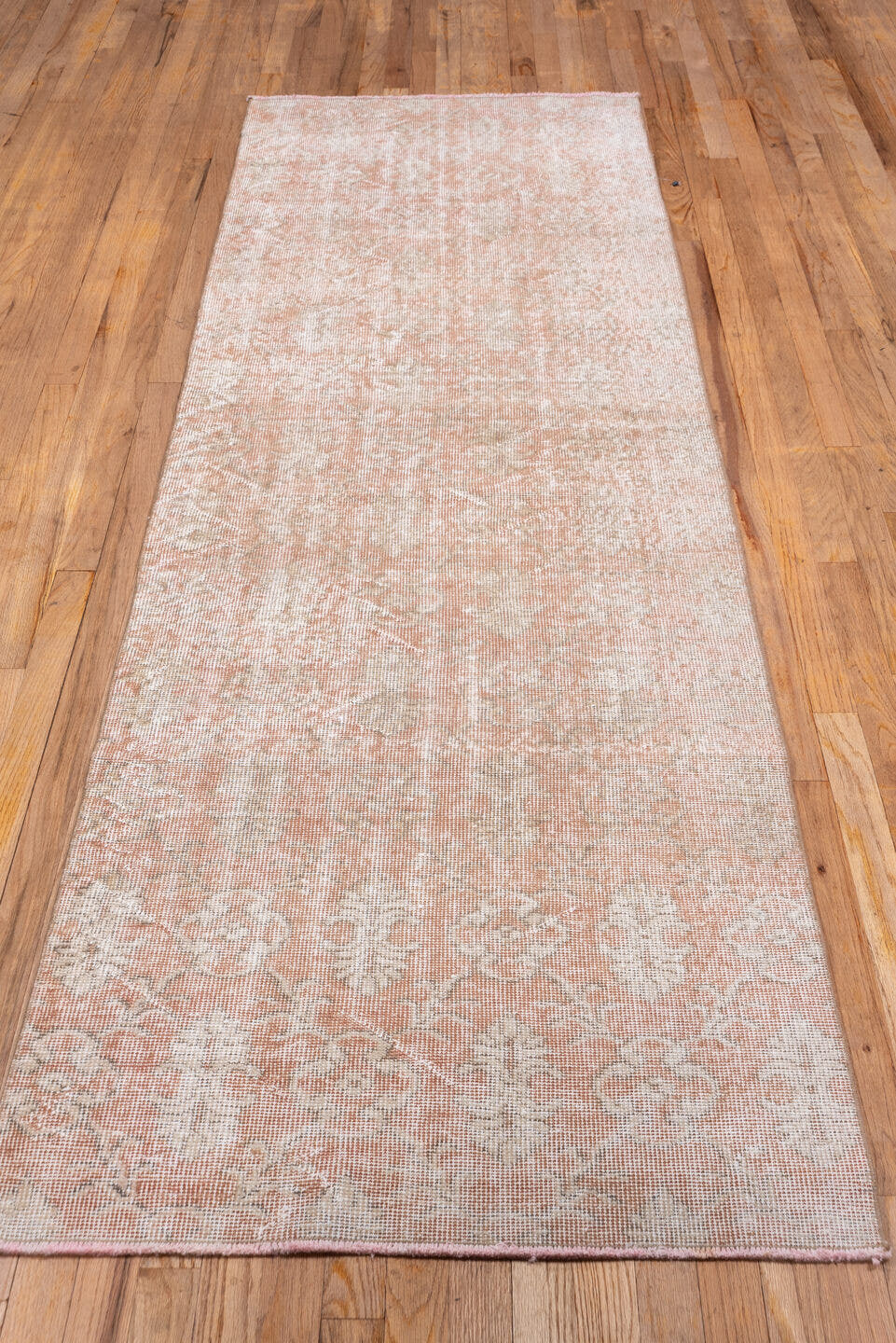 2' x 9' one-of-a-kind handmade vintage Oushak runner rug. Color palette: blush, ivory, cream, rose, pink, red