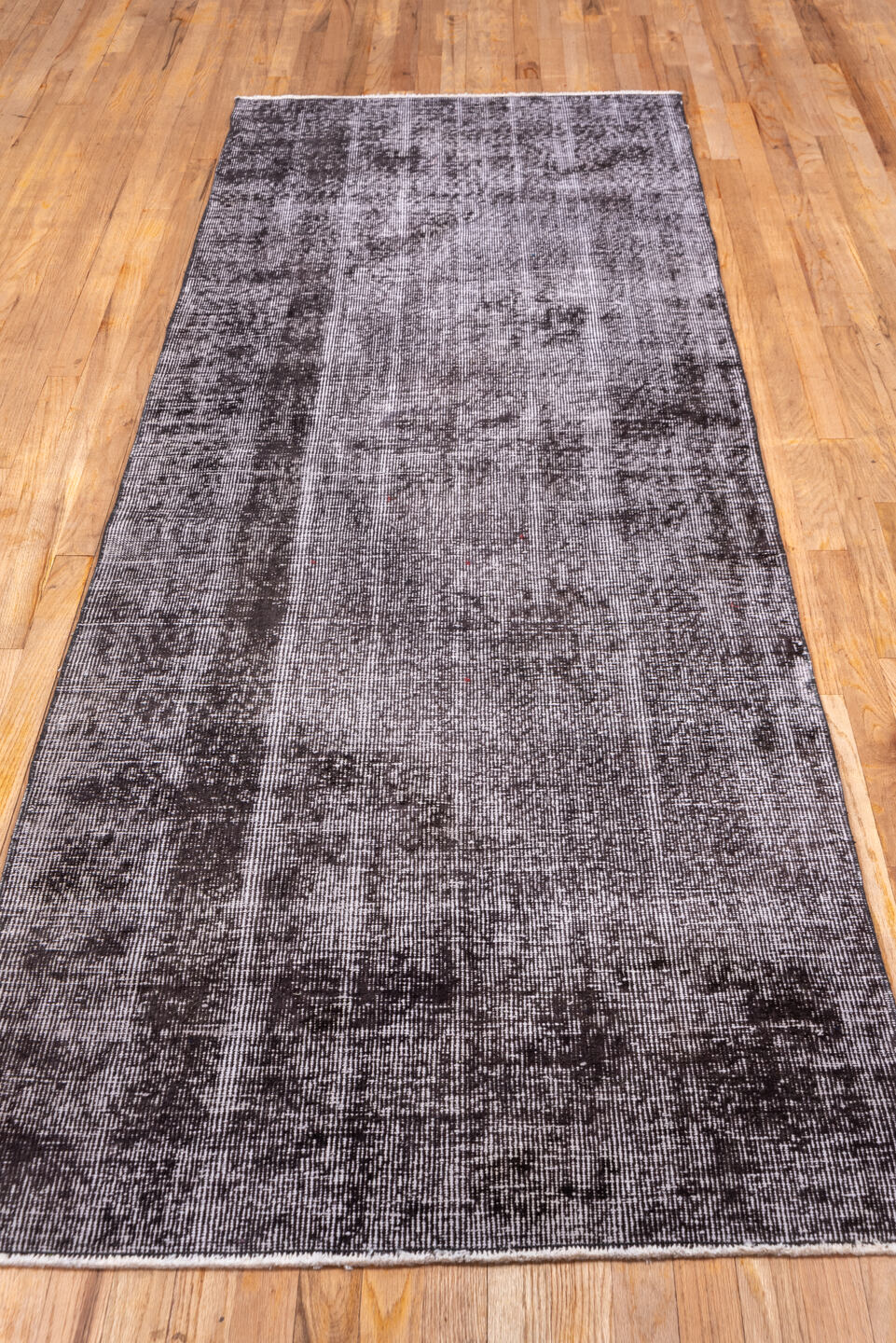 3' x 9' one-of-a-kind handmade vintage Overdyed runner rug. Color palette: gray, light gray, off-white, pink, silver