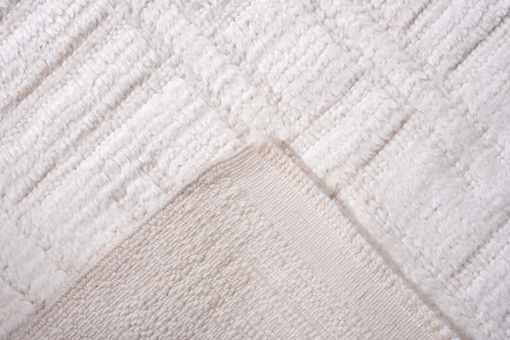 4' x 7' one-of-a-kind handmade vintage Tulu rug. Color palette: ivory, cream, beige