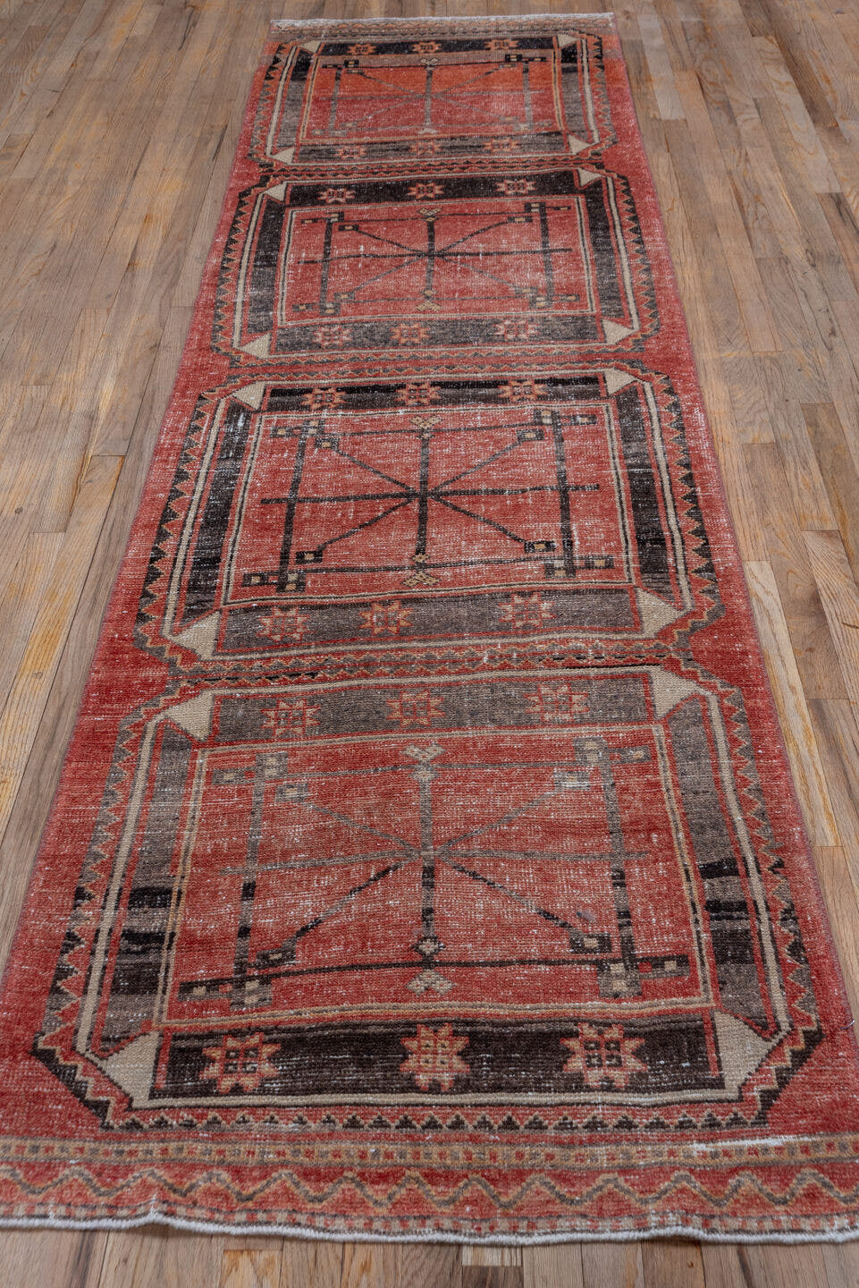 3' x 11' one-of-a-kind handmade vintage Oushak runner rug. Color palette: terra cotta, charcoal, ivory, rose, taupe, brown
