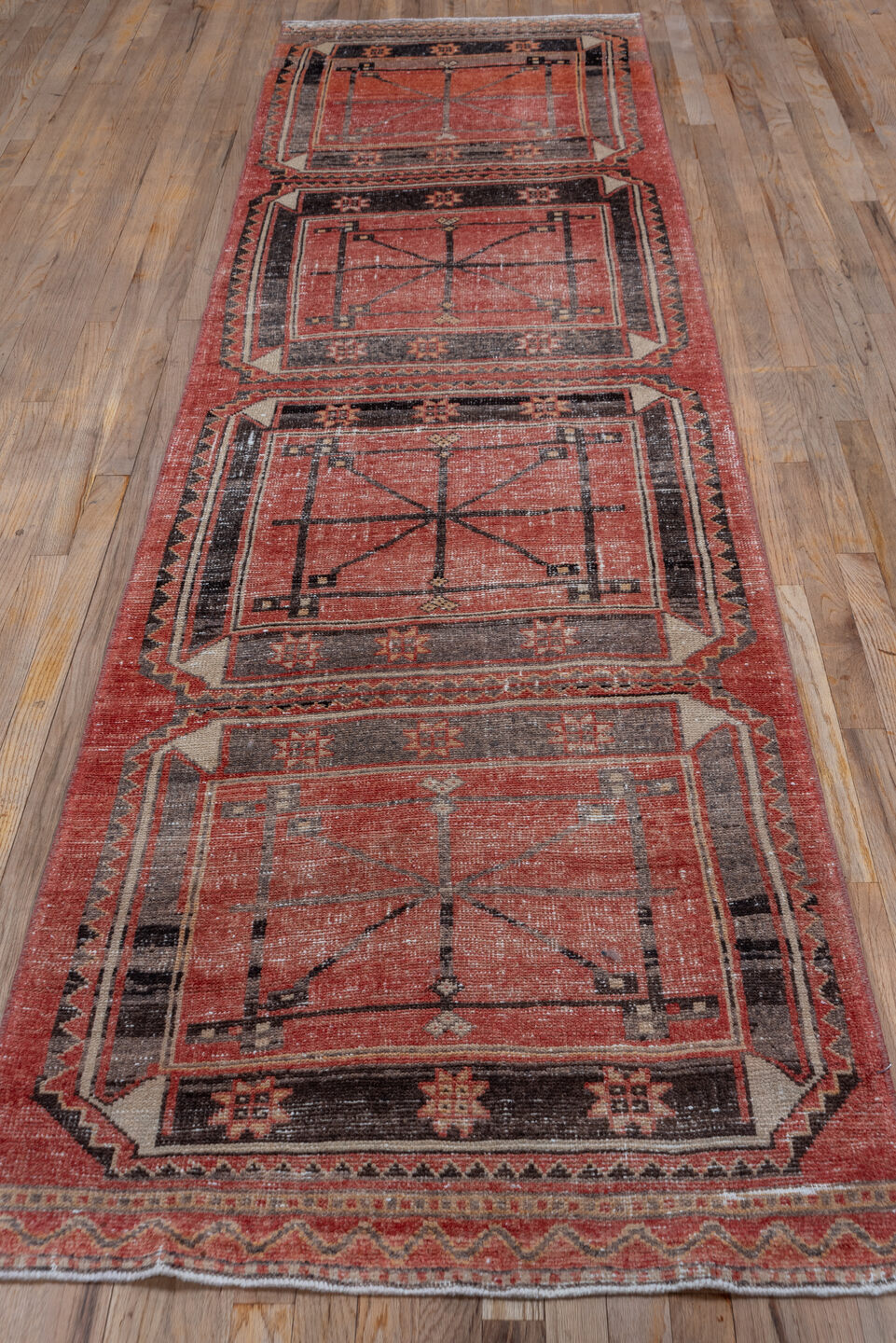 3' x 11' one-of-a-kind handmade vintage Oushak runner rug. Color palette: brown, gray, orange, pink, red