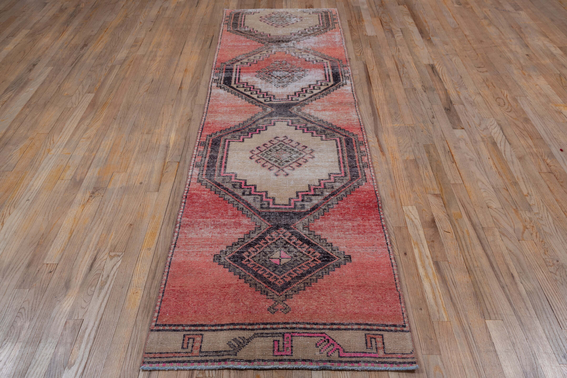2' x 9' one-of-a-kind handmade vintage Oushak runner rug. Color palette: brown, gray, light gray, pink, red