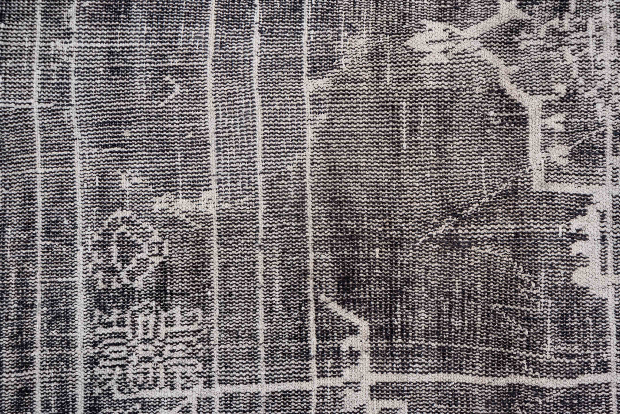 7' x 9' one-of-a-kind handmade vintage Overdyed rug. Color palette: charcoal, ivory, taupe, slate, gray, black, beige