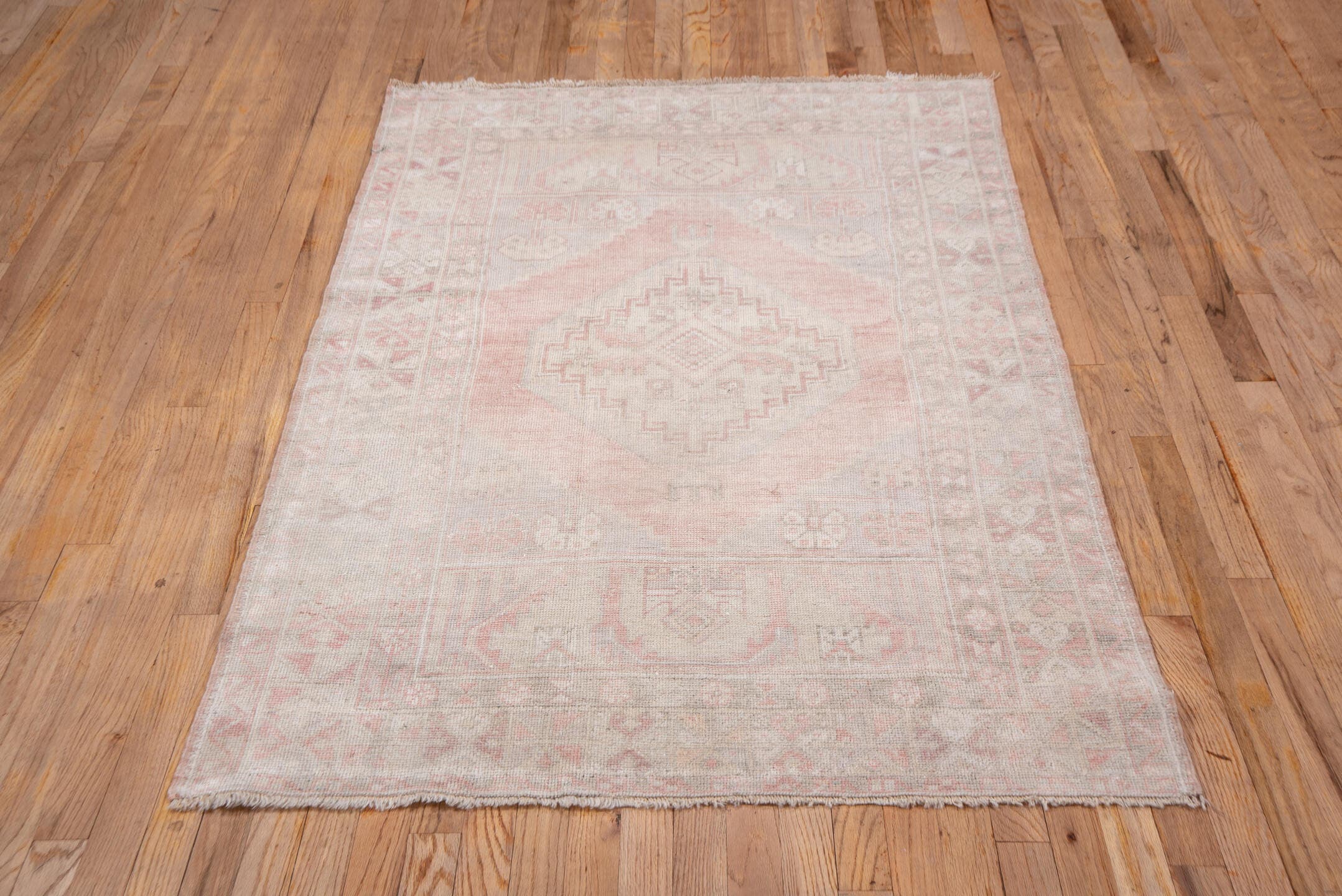 3' x 5' one-of-a-kind handmade vintage Oushak small size rug. Color palette: blush, ivory, taupe, pale rose, beige, sand