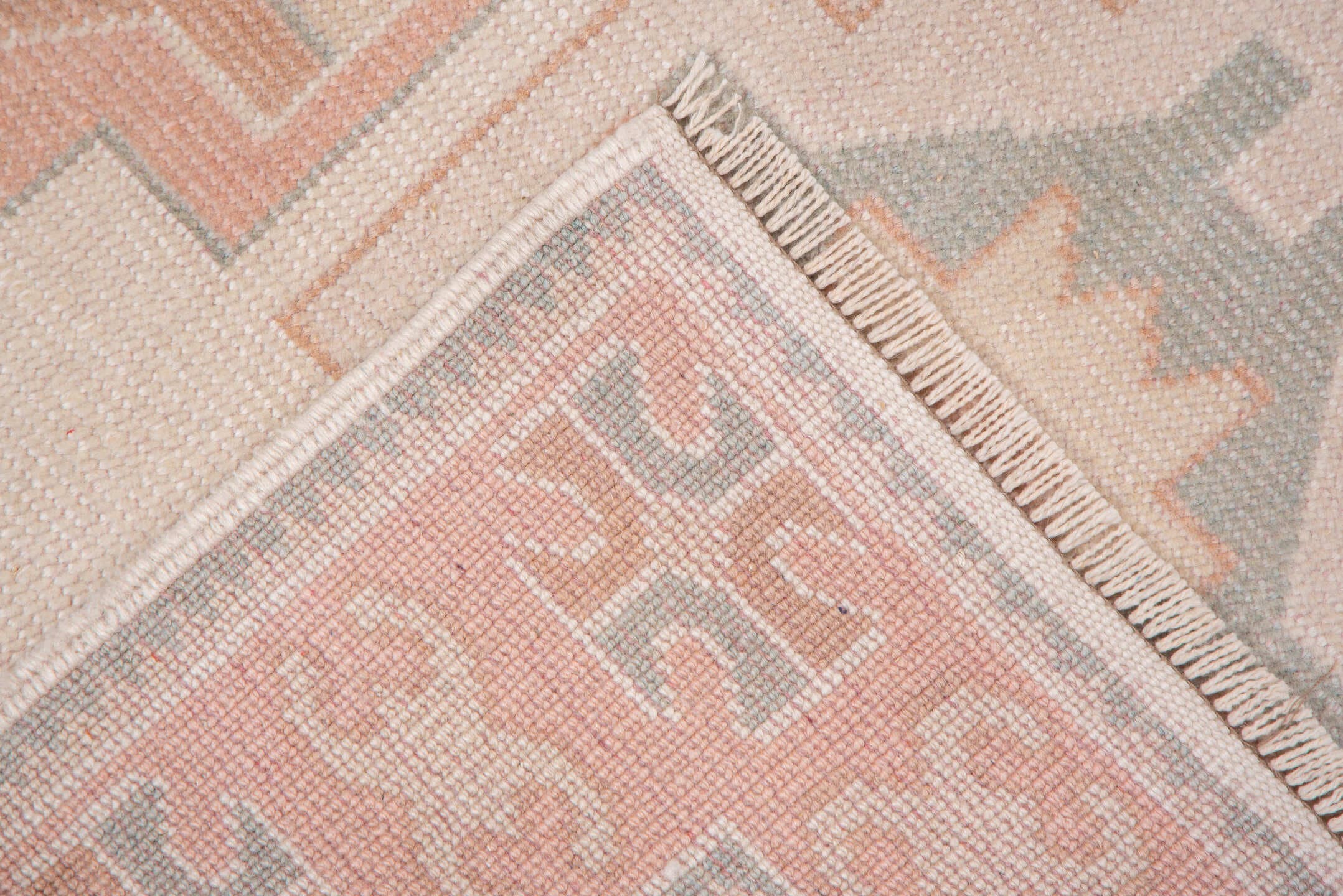 2' x 4' one-of-a-kind handmade vintage Oushak small size rug. Color palette: ivory, blush, peach, sage, taupe, pink