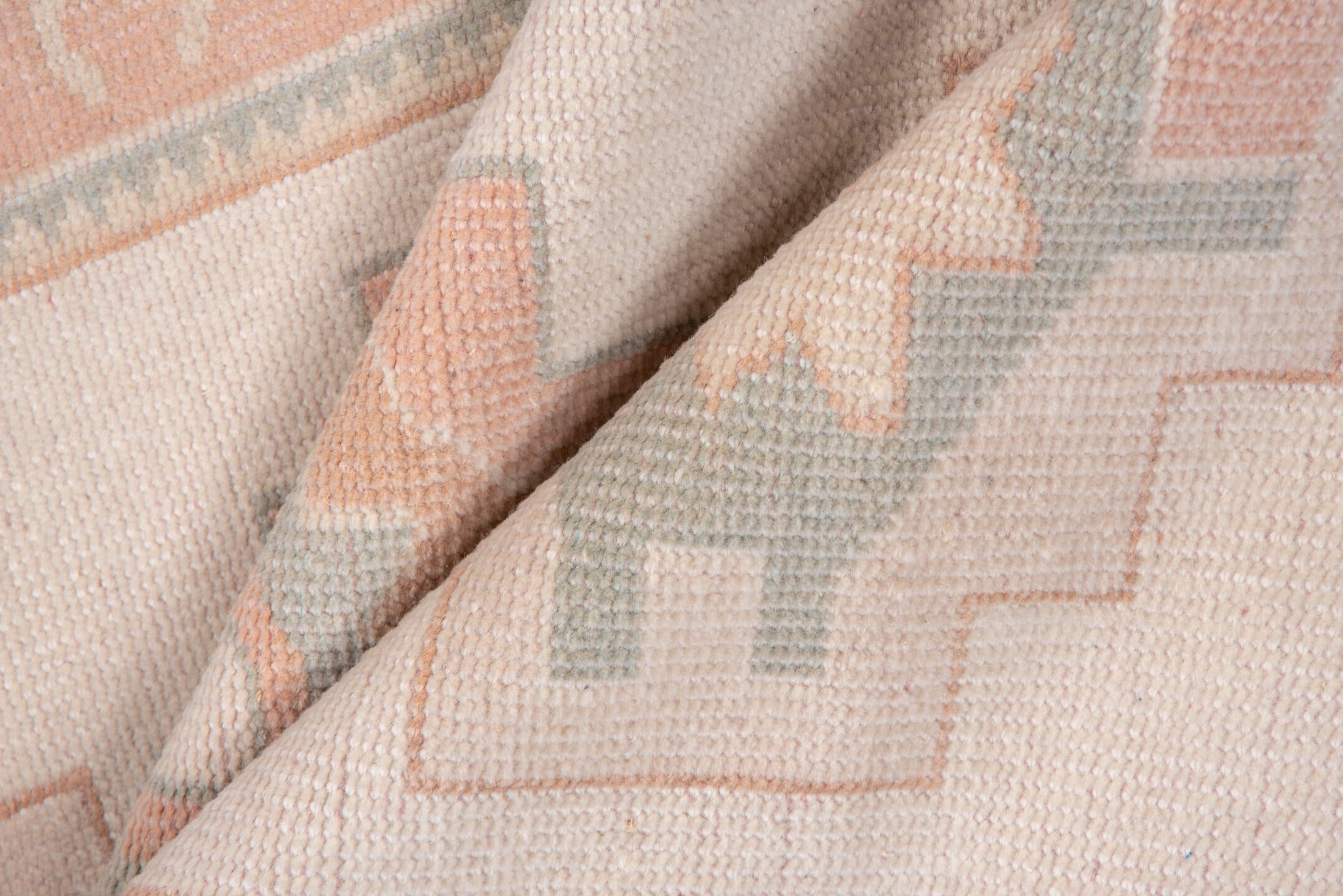 2' x 4' one-of-a-kind handmade vintage Oushak small size rug. Color palette: ivory, blush, peach, sage, taupe, pink