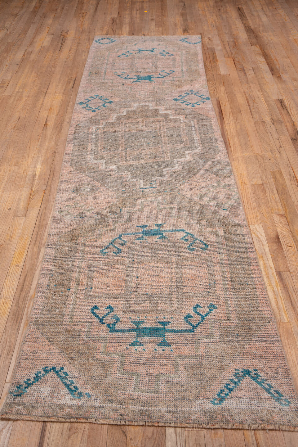 2' x 11' one-of-a-kind handmade vintage Oushak runner rug. Color palette: blush, taupe, teal, beige, ivory, camel, gray