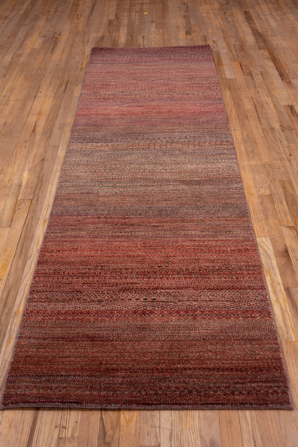 2' x 10' one-of-a-kind handmade vintage Gabbe runner rug. Color palette: brown, off-white, pink, red, redwood, snow, white