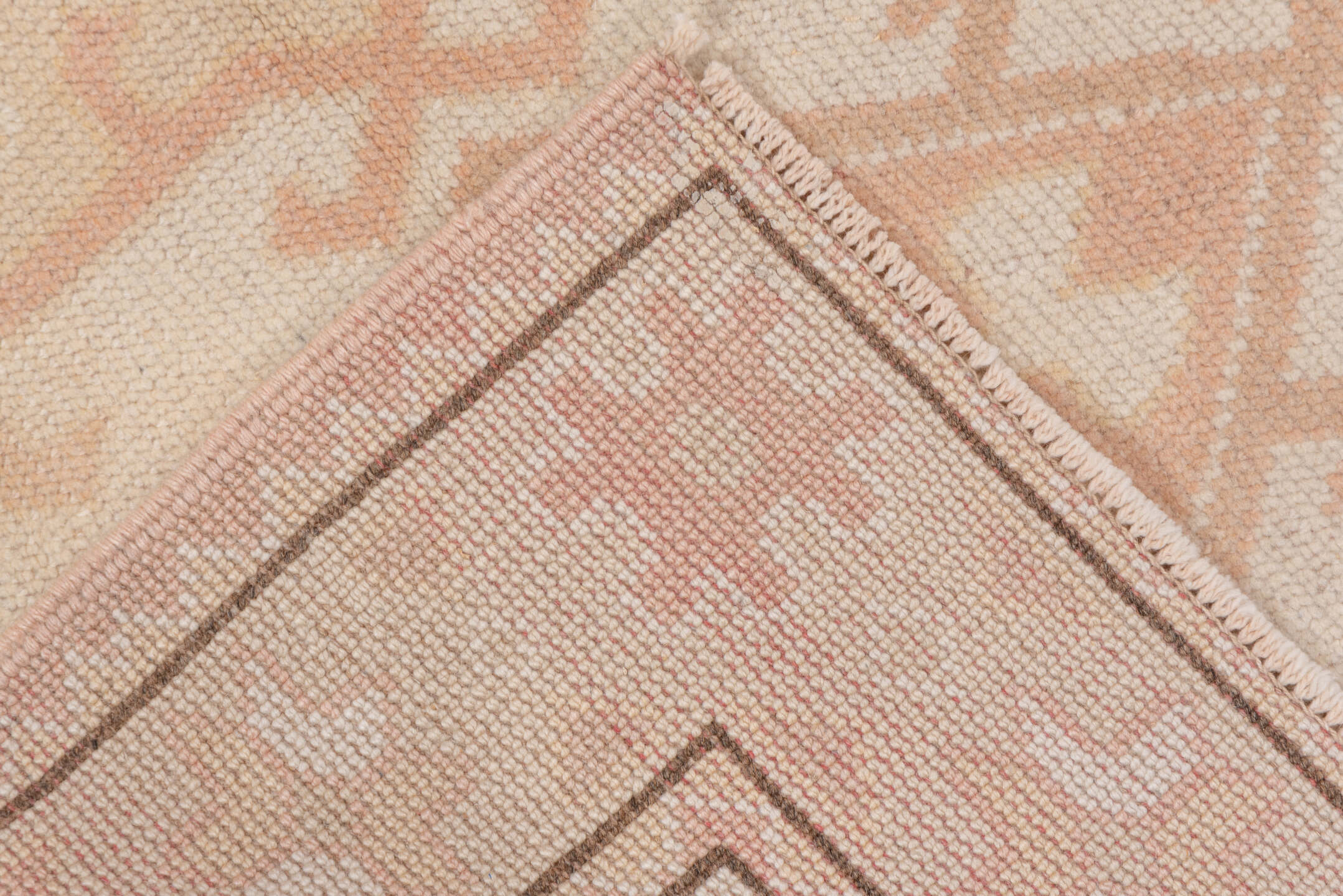 2' x 4' one-of-a-kind handmade vintage Oushak small size rug. Color palette: ivory, blush, peach, taupe, camel, pink
