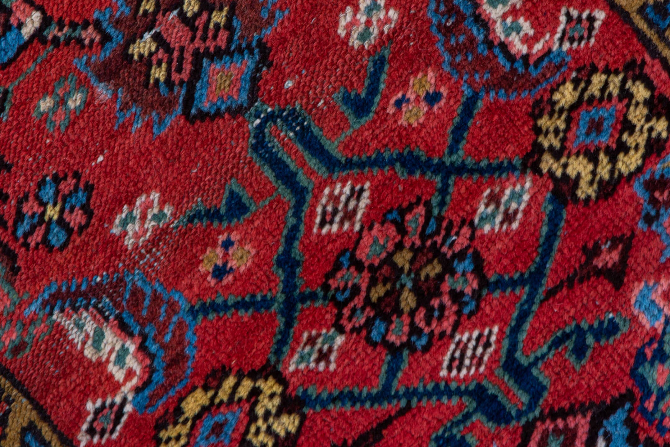 2' x 13' one-of-a-kind handmade vintage Heriz runner rug. Color palette: red, blue, navy, ivory, rust, gold, charcoal
