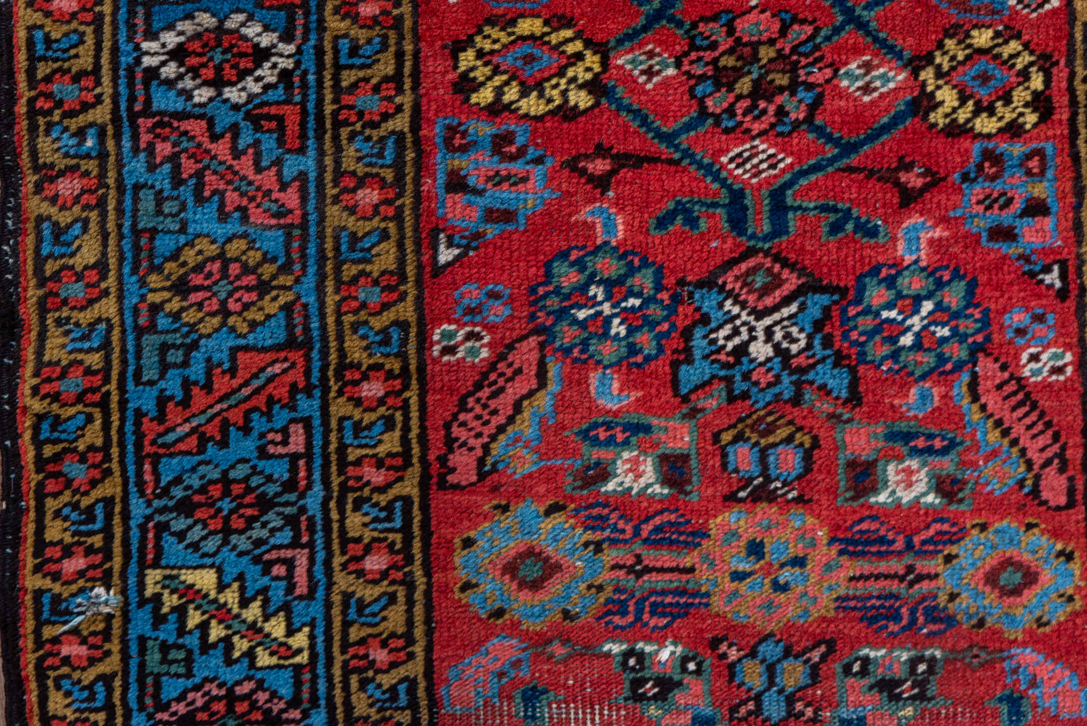 2' x 13' one-of-a-kind handmade vintage Heriz runner rug. Color palette: red, blue, navy, ivory, rust, gold, charcoal