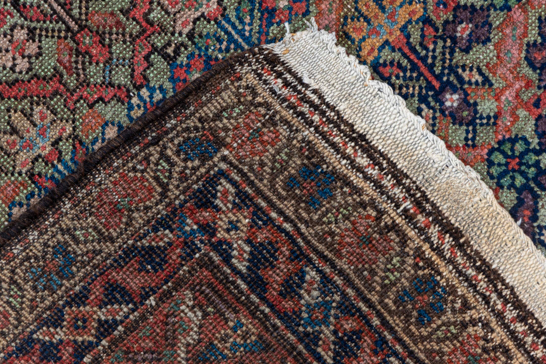 5' x 10' one-of-a-kind handmade vintage Mahal medium size rug. Color palette: rust, brown, navy, taupe, terracotta, slate
