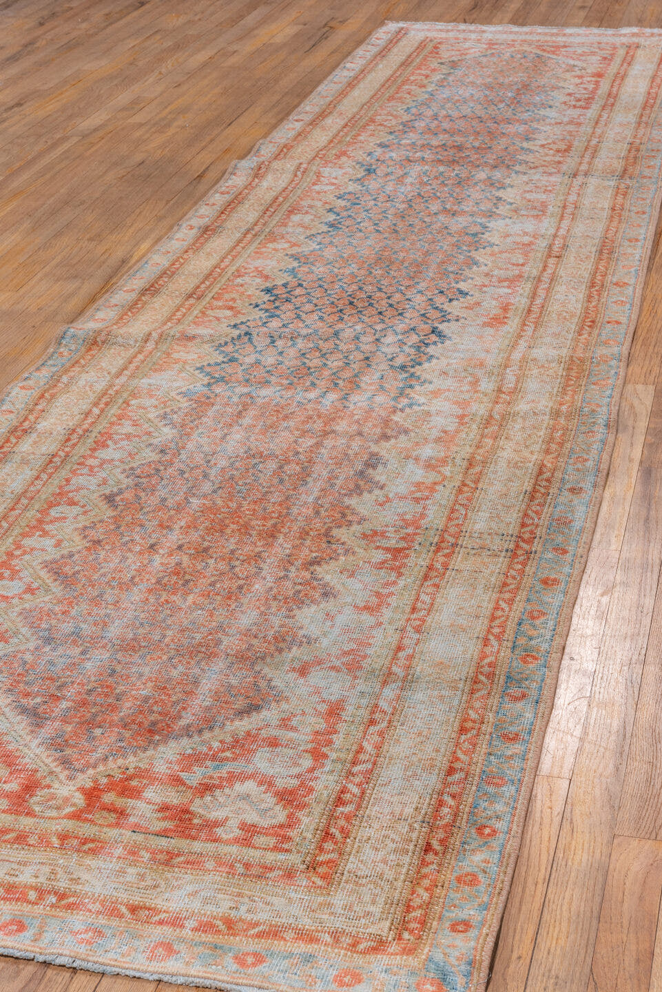 3' x 13' one-of-a-kind handmade vintage Mahal runner rug. Color palette: sky blue, ivory, coral, rust, peach, taupe