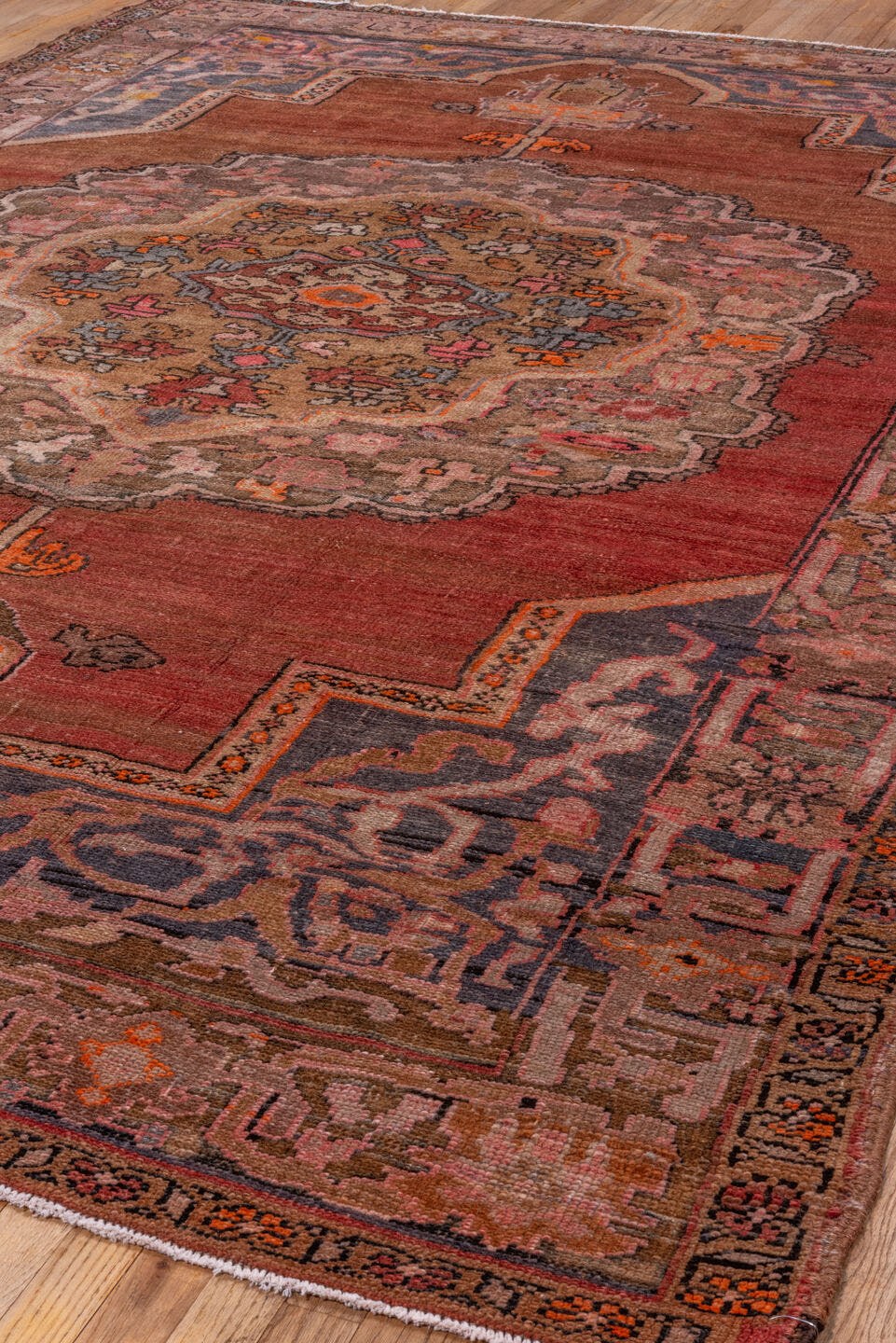 7' x 11' one-of-a-kind handmade vintage Kars large size rug. Color palette: rose, terra cotta, taupe, slate, ivory, rust