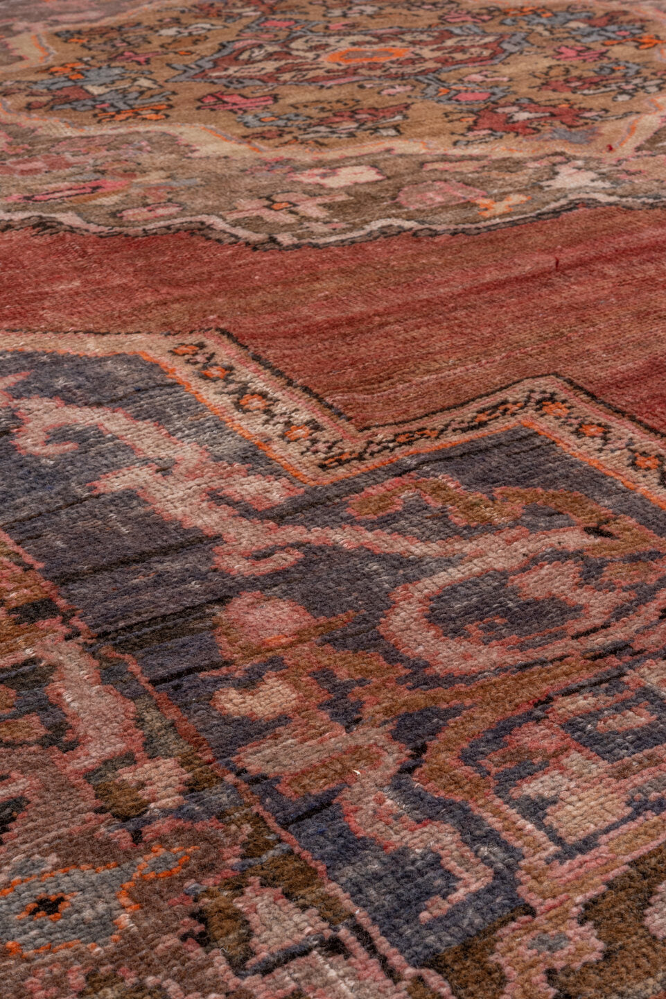 7' x 11' one-of-a-kind handmade vintage Kars large size rug. Color palette: brown, gray, pink, red, redwood