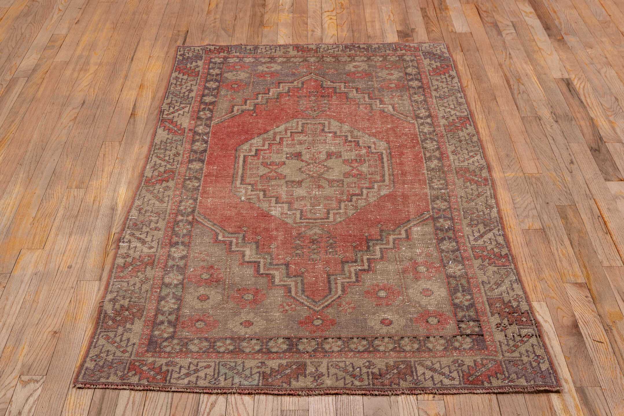 3' x 6' one-of-a-kind handmade vintage Oushak small size rug. Color palette: terra cotta, taupe, ivory, rose, rust, brown