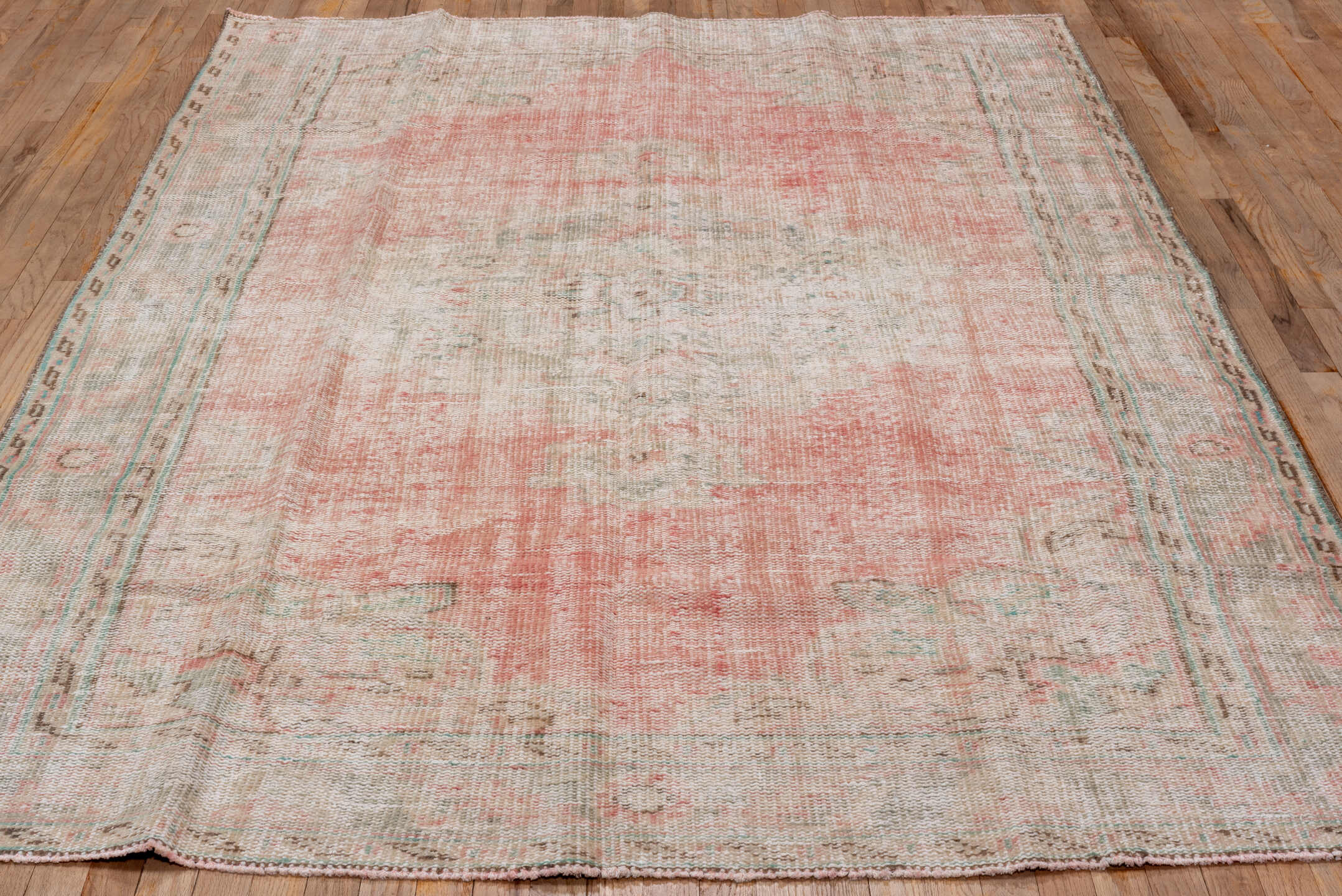 6' x 9' one-of-a-kind handmade vintage Oushak medium size rug. Color palette: blush, ivory, taupe, pale blue, sage, rose
