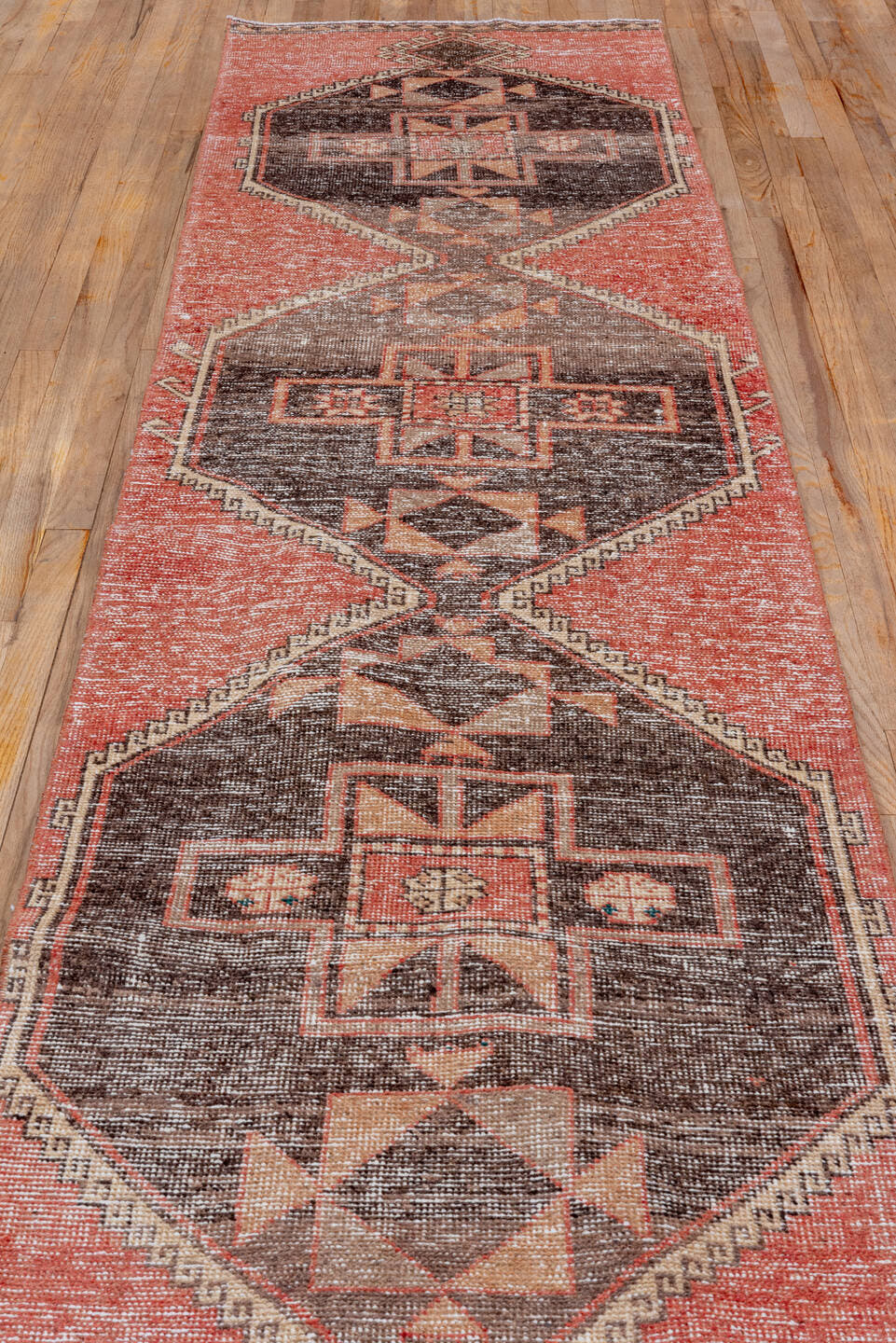 2' x 12' one-of-a-kind handmade vintage Oushak runner rug. Color palette: terra cotta, charcoal, blush, ivory, taupe, brown