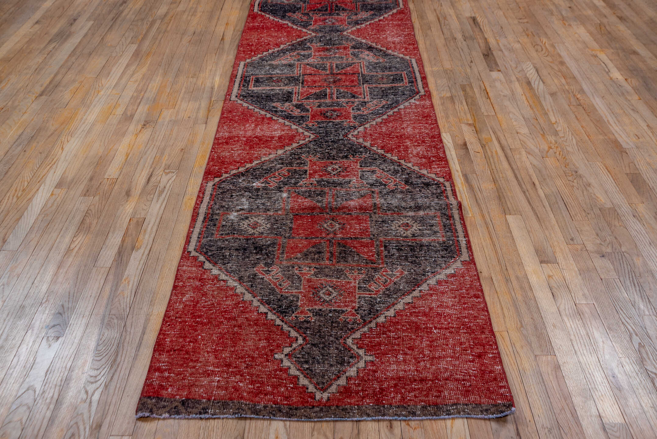 3' x 12' one-of-a-kind handmade vintage Oushak runner rug. Color palette: brown, gray, pink, red