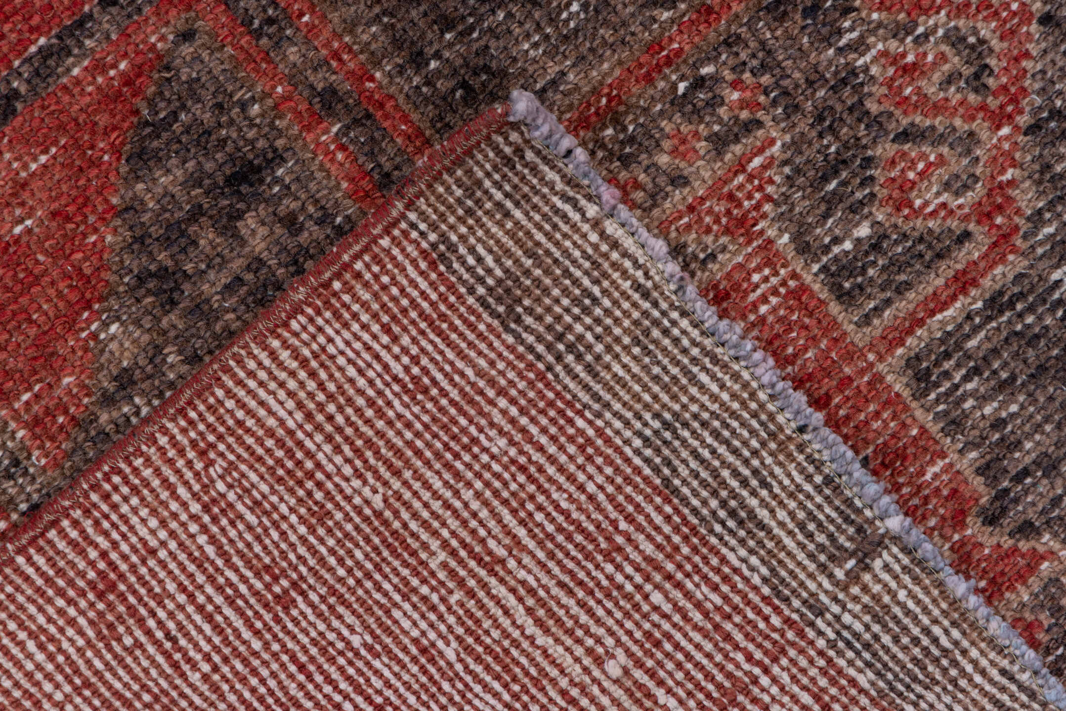 3' x 12' one-of-a-kind handmade vintage Oushak runner rug. Color palette: brown, gray, pink, red