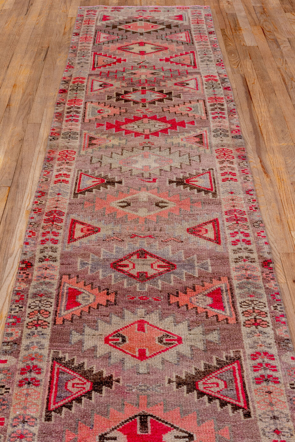 2' x 11' one-of-a-kind handmade vintage Oushak runner rug. Color palette: taupe, rose, crimson, ivory, charcoal, blush