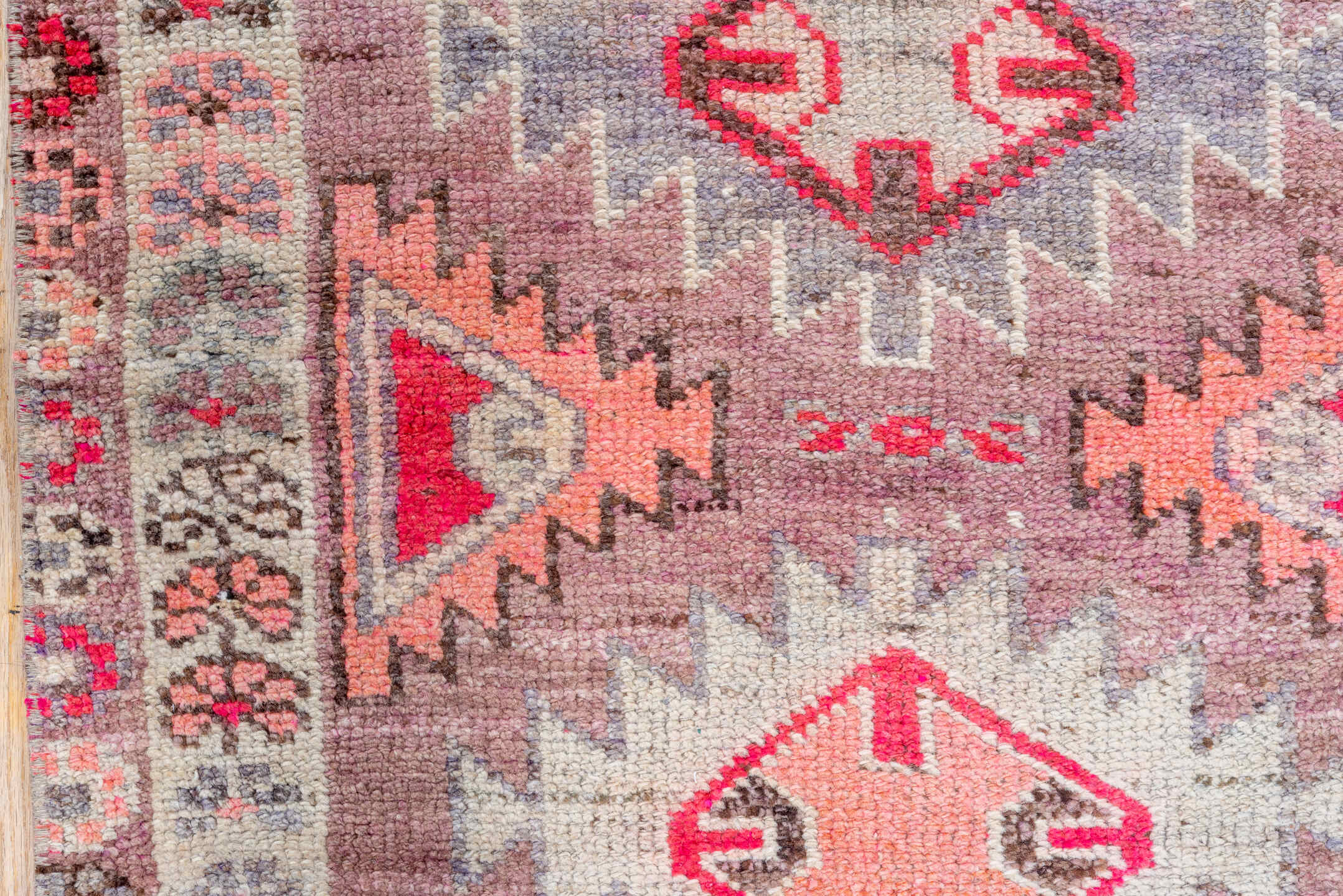 2' x 11' one-of-a-kind handmade vintage Oushak runner rug. Color palette: brown, gray, light gray, off-white, pink, red
