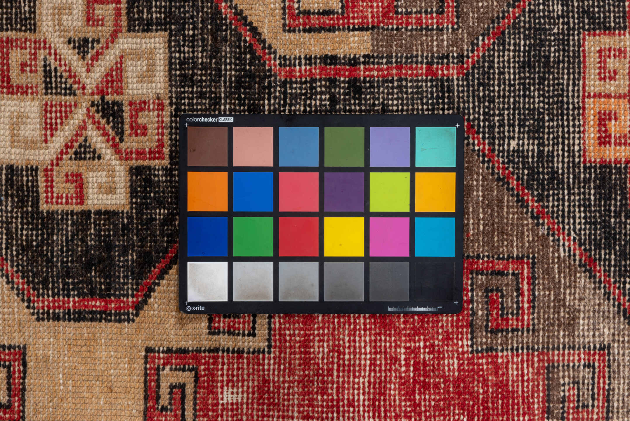 2' x 7' one-of-a-kind handmade vintage Oushak runner rug. Color palette: black, brown, gray, indian red, orange, pink, red