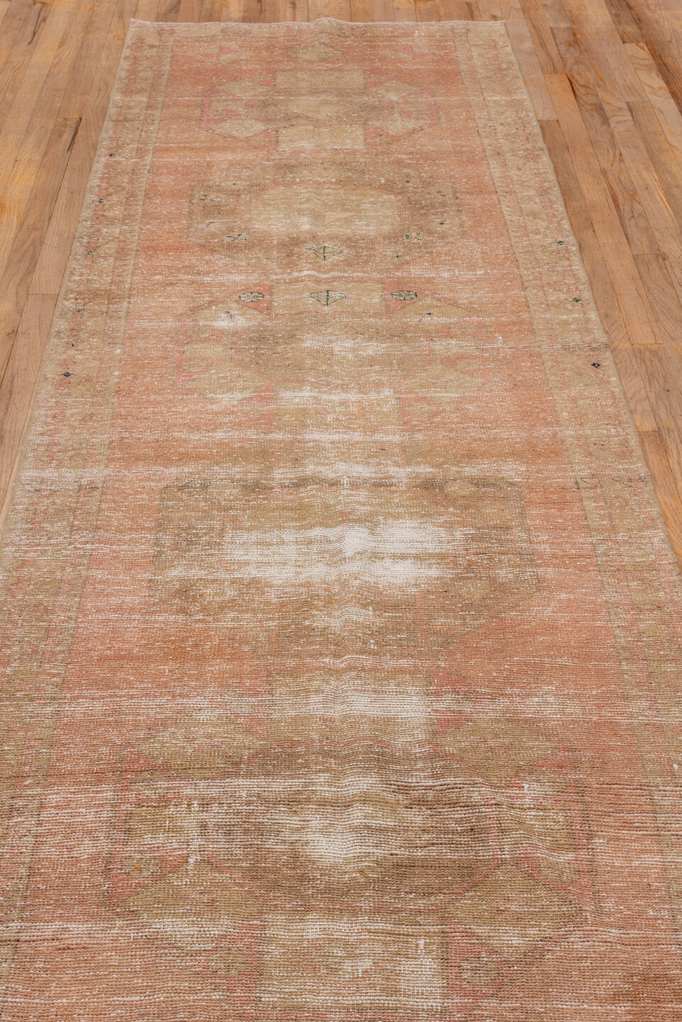 3' x 11' one-of-a-kind handmade vintage Oushak runner rug. Color palette: blush, beige, taupe, ivory, rose, sage, brown