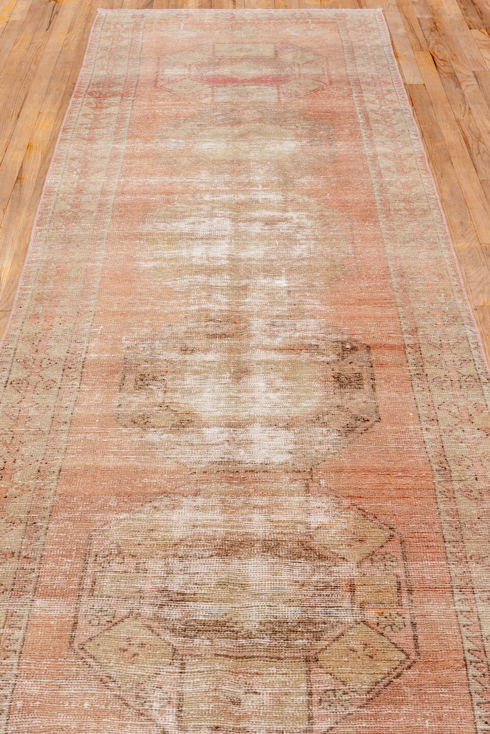 3' x 11' one-of-a-kind handmade vintage Oushak runner rug. Color palette: blush, ivory, taupe, rose, beige, camel, sienna