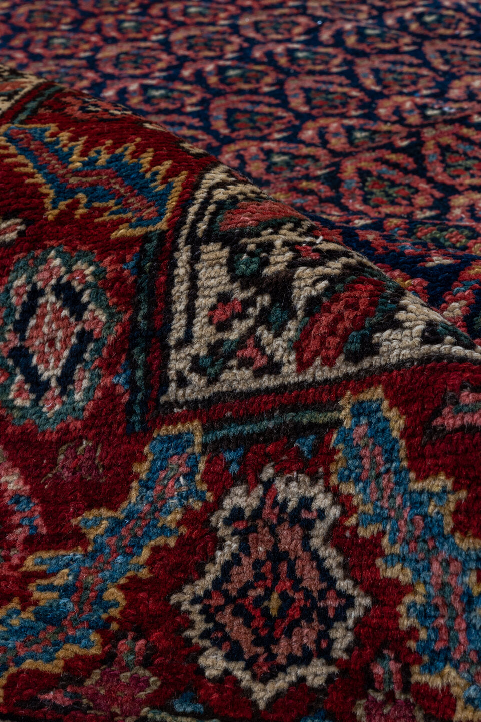 5' x 11' one-of-a-kind handmade vintage Malayer rug. Color palette: rust, navy, ivory, burgundy, camel, charcoal, terracotta