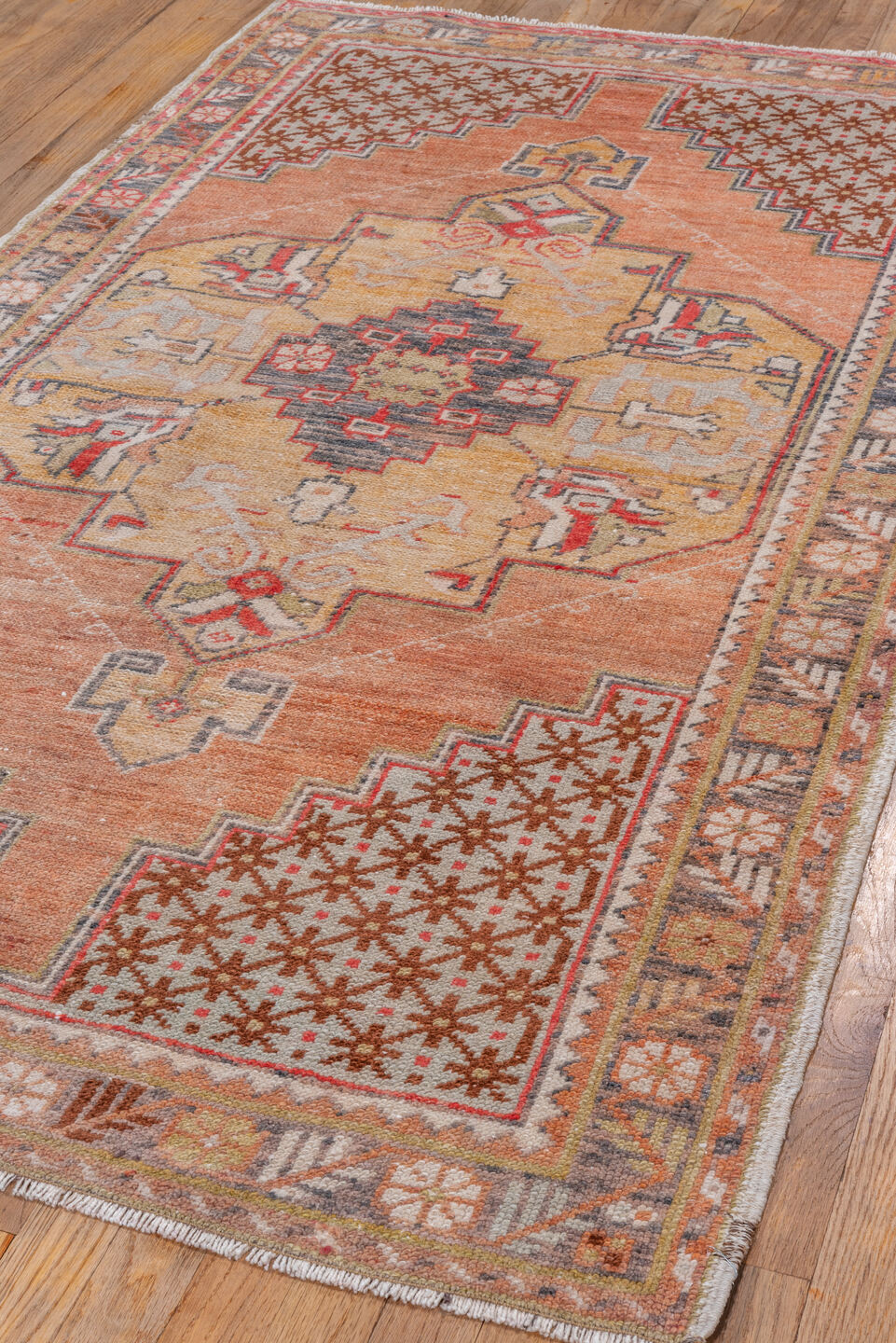 3' x 6' one-of-a-kind handmade vintage Oushak small size rug. Color palette: salmon, ivory, gold, charcoal, rust, taupe