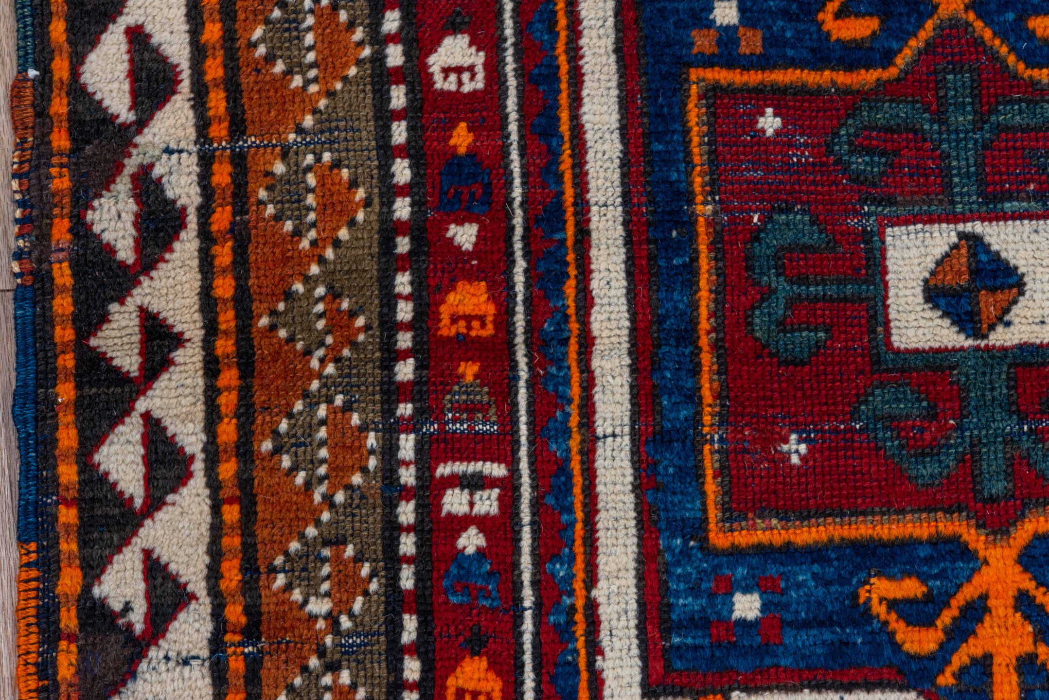 3' x 4' one-of-a-kind handmade vintage Kazak small size rug. Color palette: brown, gray, pink, red