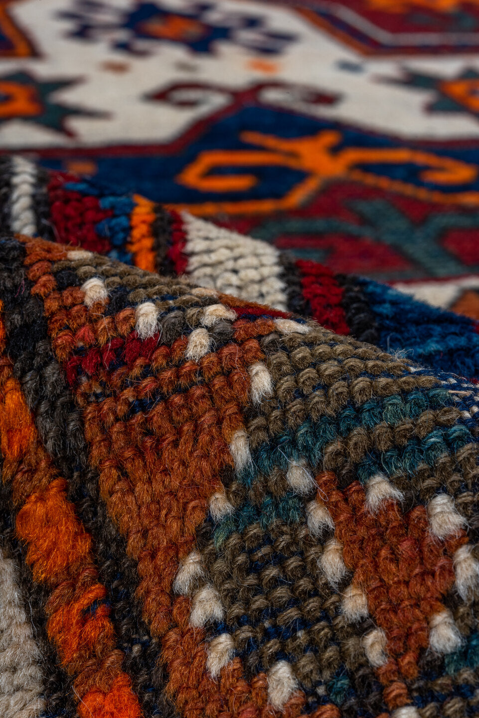 3' x 4' one-of-a-kind handmade vintage Kazak small size rug. Color palette: brown, gray, pink, red